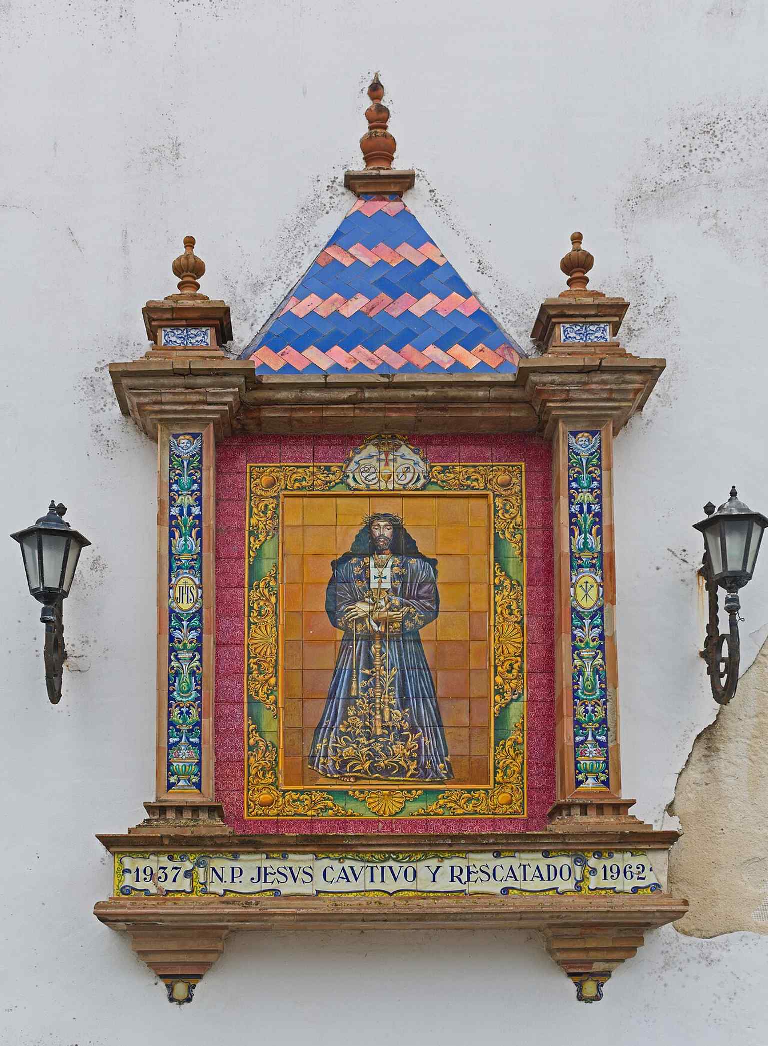 A wall relief of Christ inside the Church of Santa Cruz, a good example of the devotional artworks preserved after the church’s reconstruction.