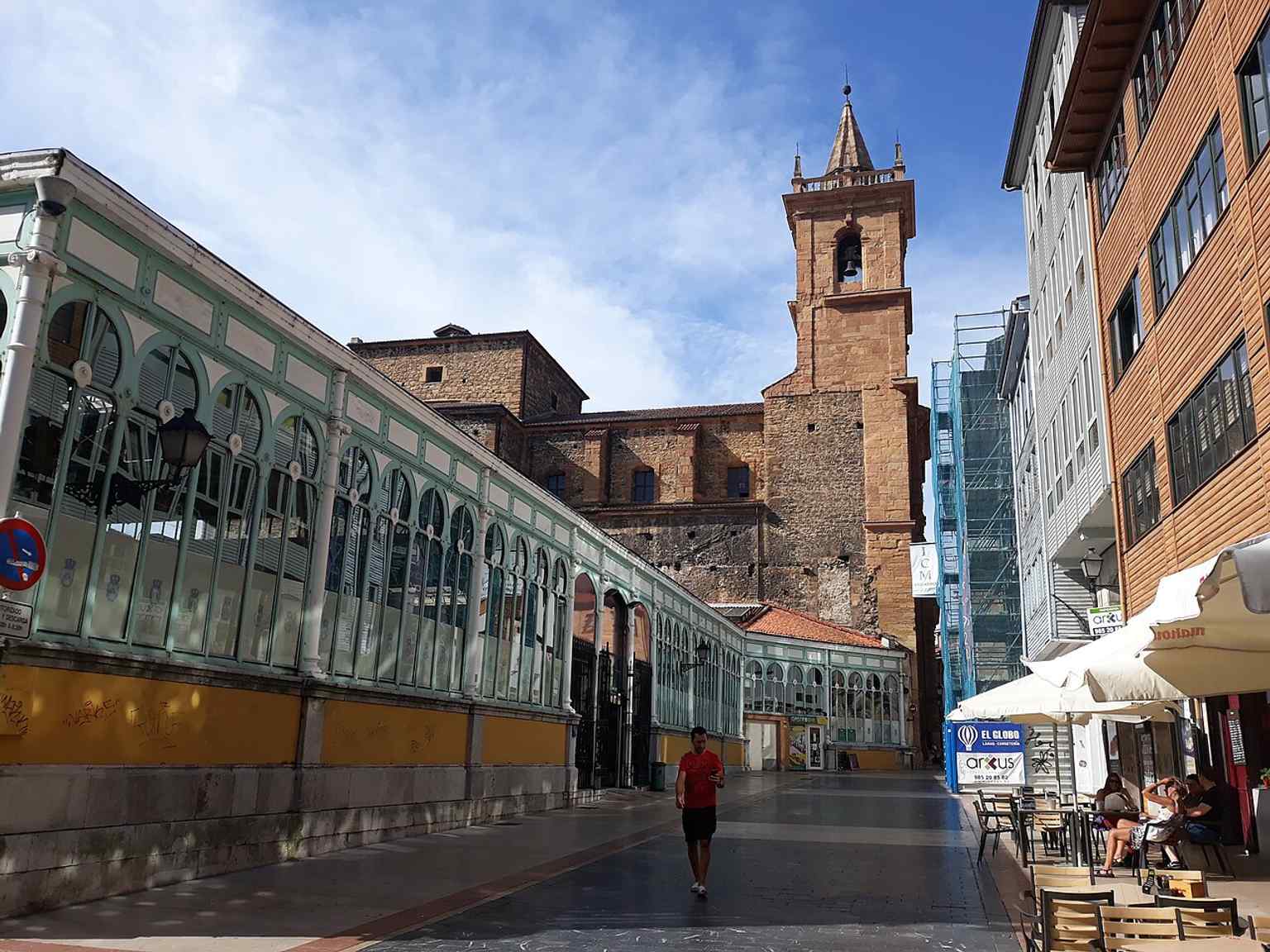 The church façade beside El Fontán market — San Isidoro was once part of the Jesuit complex that stood here before the market was built.