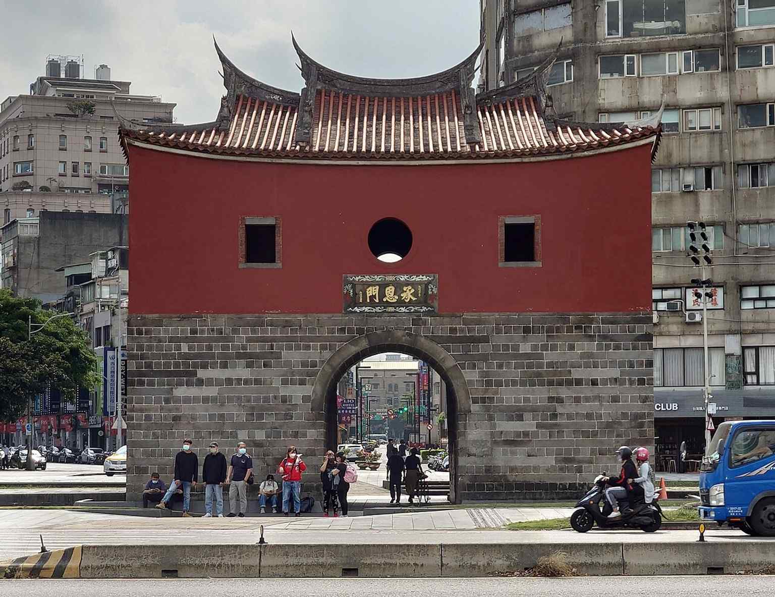 The north side of the gate in daylight, a clear look at the original brick-and-stone fortress-style structure that survived when most Taipei city walls were demolished.
