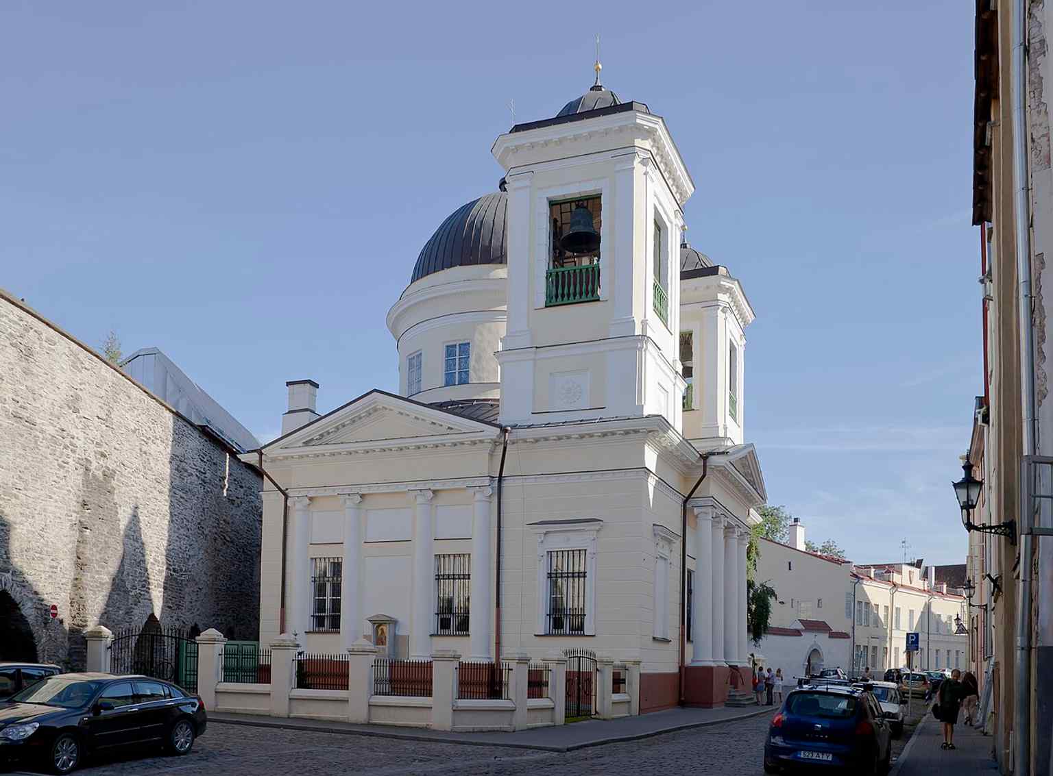 Interior of St. Nicholas Church, where the historic iconostasis and the layered painted decoration reflect the church’s long rebuilding history.