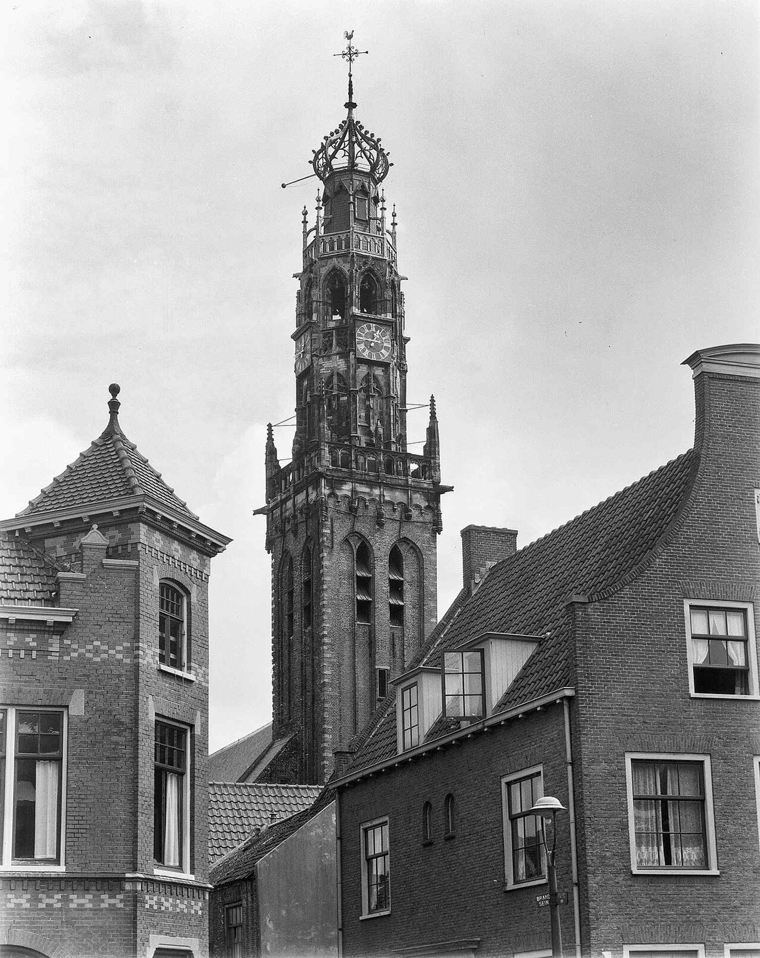 An older northwest view of the tower from 1951, valuable for showing the building before recent restorations and surrounding changes.
