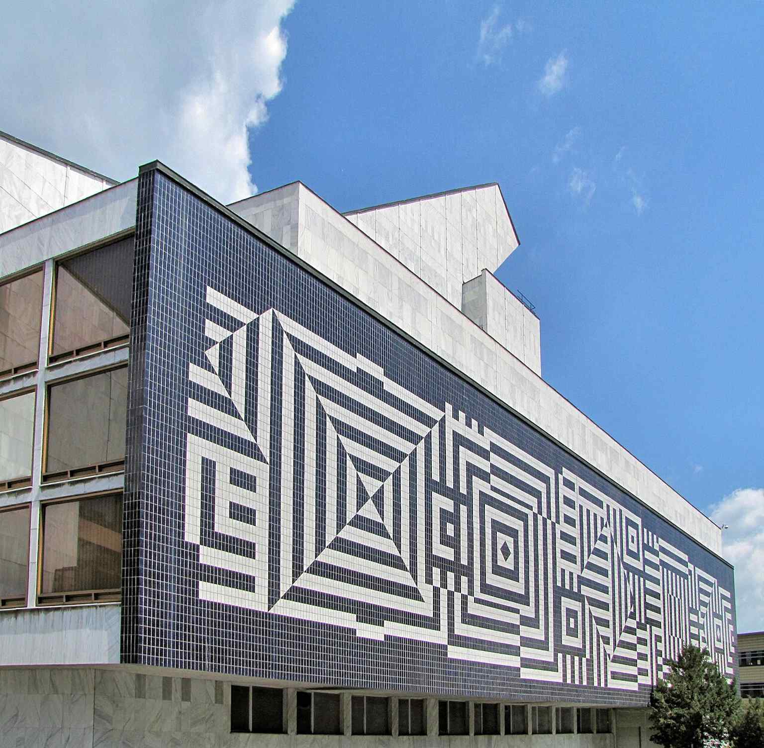 Victor Vasarely’s ceramic op-art facade mural, one of the theatre’s most distinctive details mentioned in the building description.