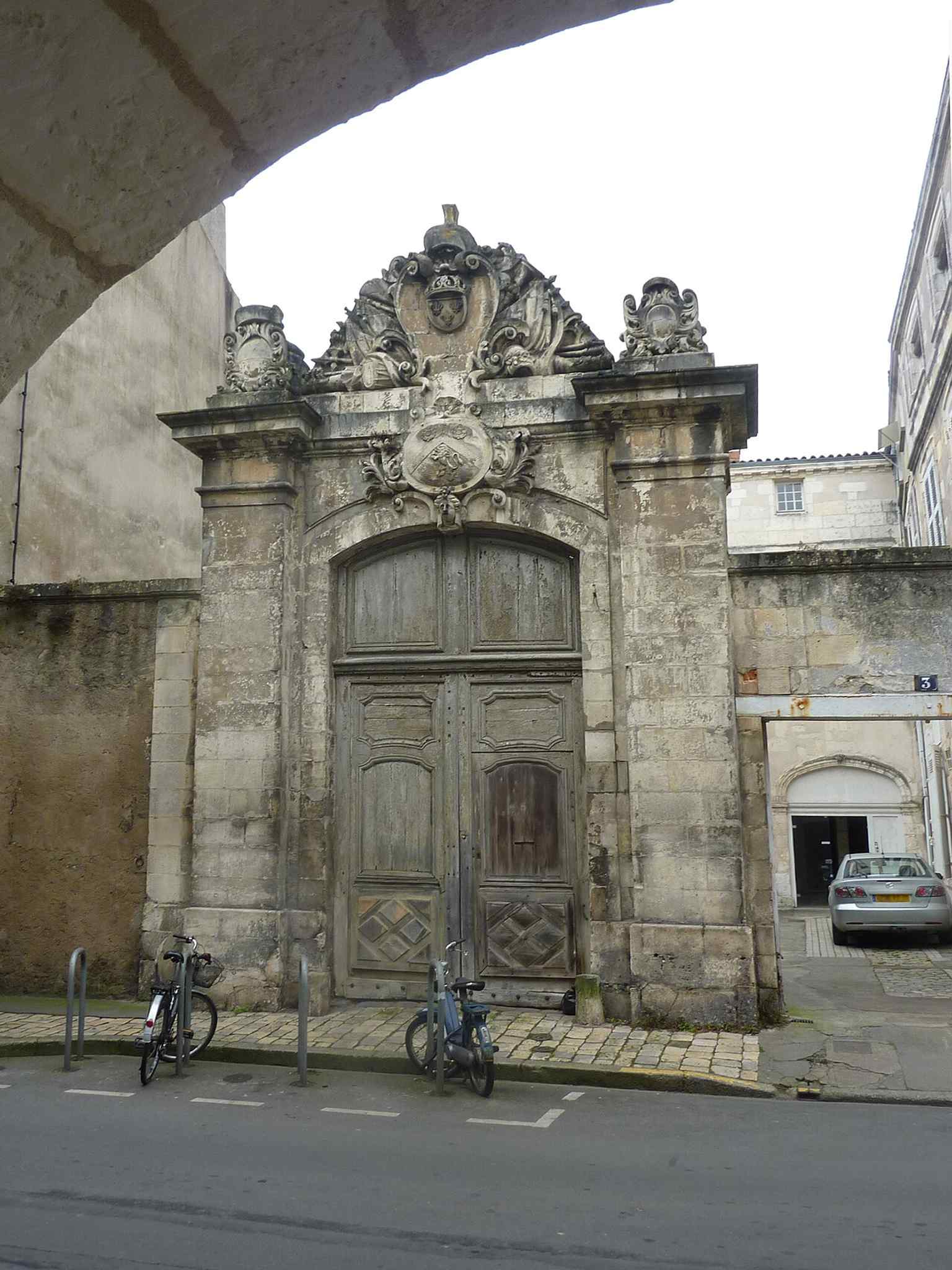 The entrance porch of the Hôtel de l’Intendance on rue Pernelle, the 1730 portal that first gave this former administrative house its official face of power.