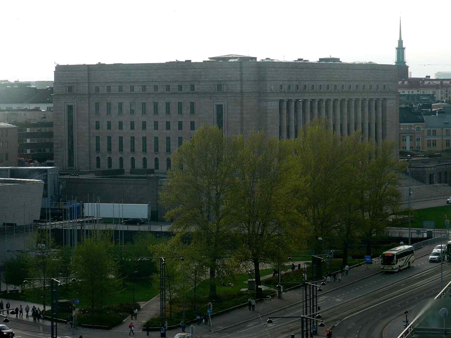 A classic side view from Hotel Torni that captures the building’s massive, cube-like form and granite exterior.