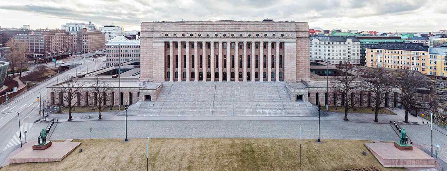 This aerial view places Parliament House in its urban setting, emphasizing its role as a landmark in central Helsinki.