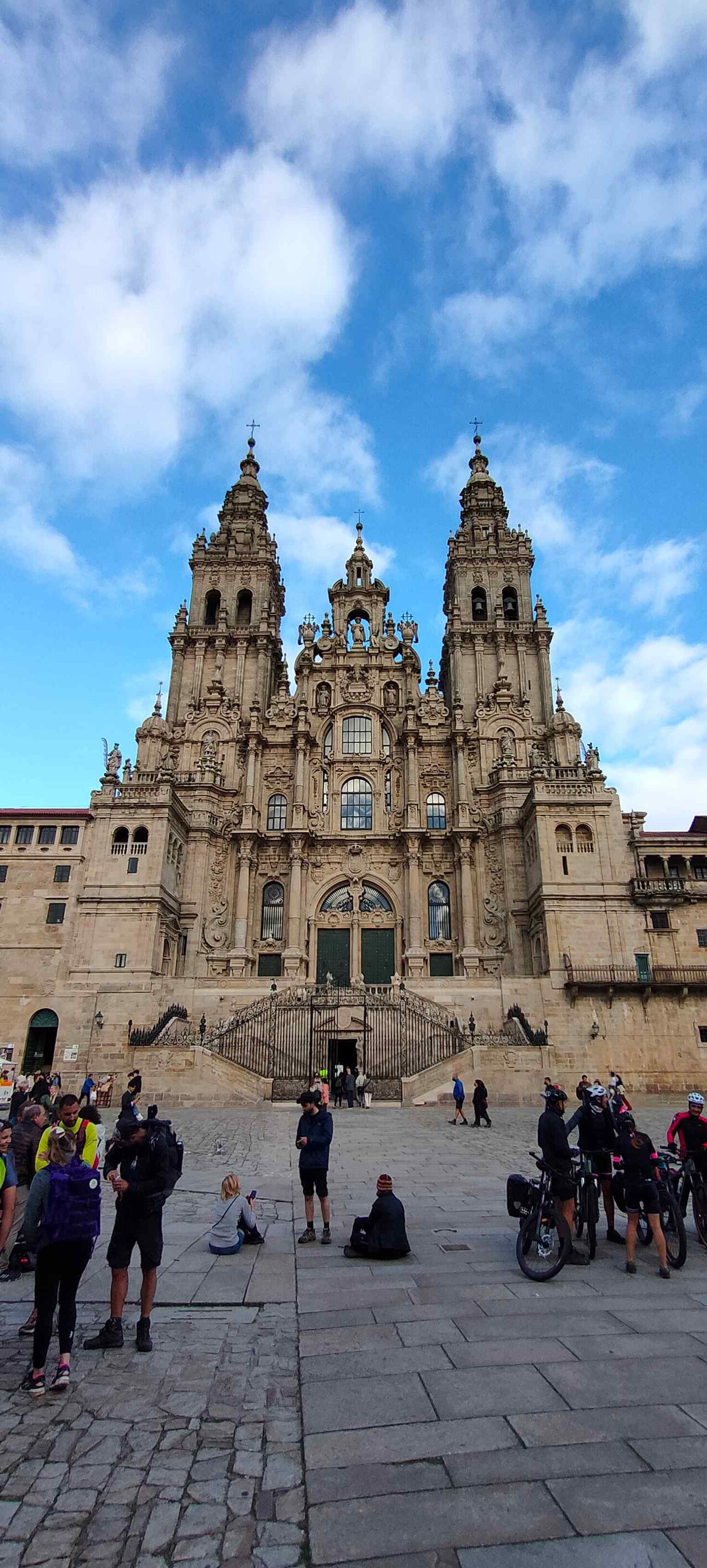 A closer view of the intricate Obradoiro facade, named after the 'obradoiro' (workshop) of stonemasons who worked in the square during the cathedral's construction.