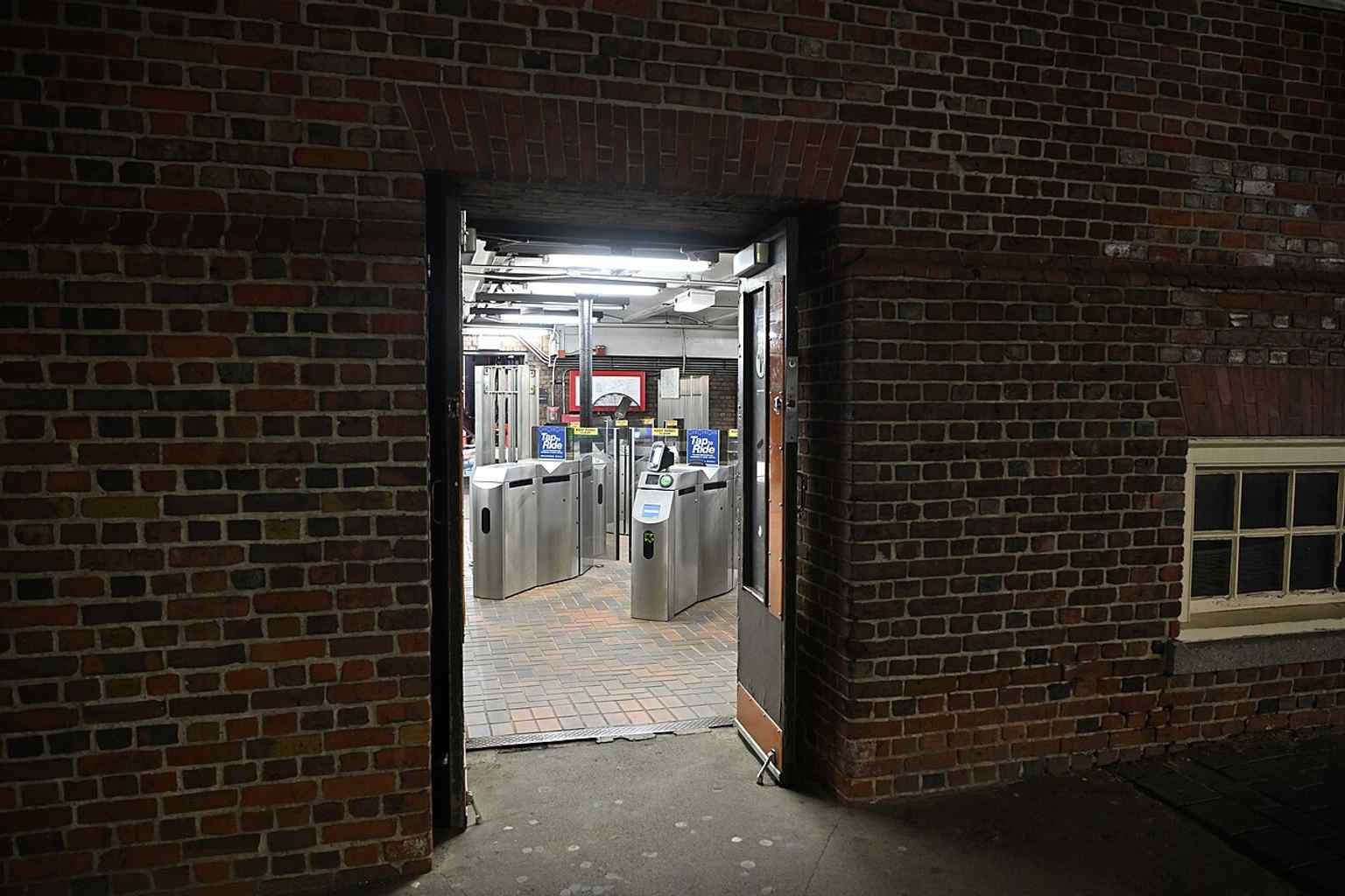 The basement entrance to State station shows how the Old State House’s lower level now connects historic Boston with the modern subway.