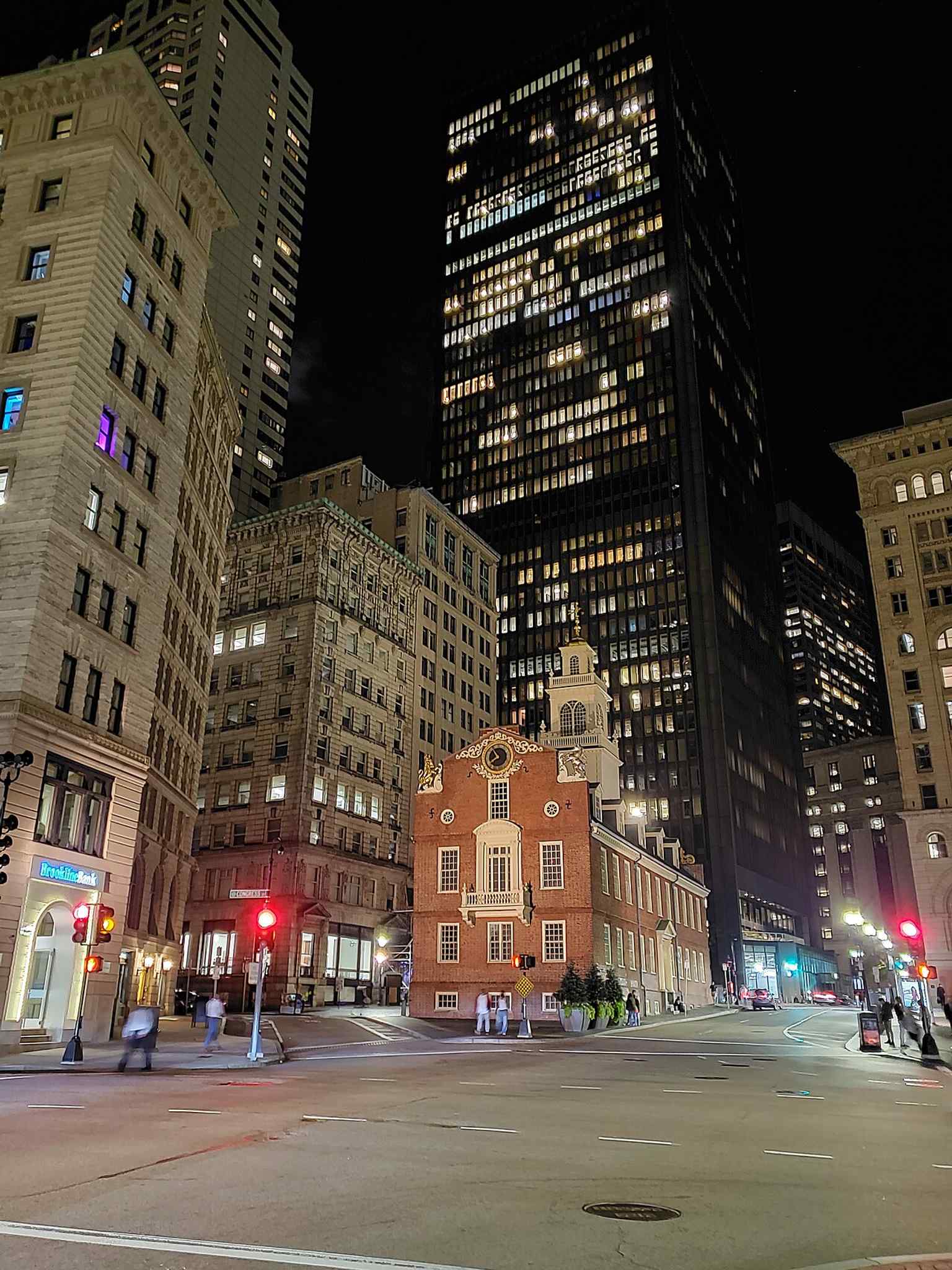 Night view of the Old State House, with the inscription tying the site to the July 18, 1776 proclamation of independence in Boston.