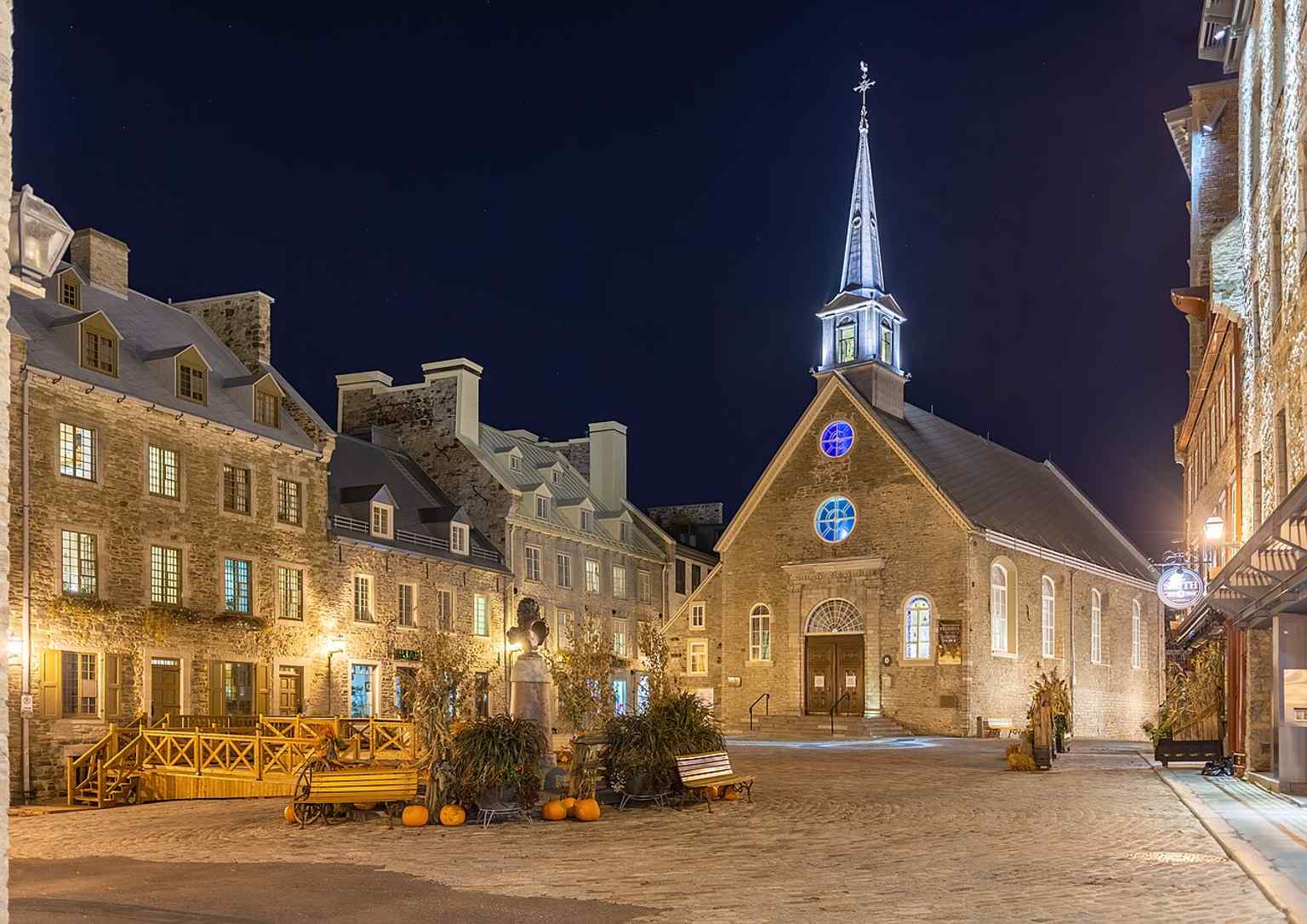 Place Royale lit up at night, with the historic Notre-Dame-des-Victoires area anchoring the square that marks the birthplace of Quebec City.