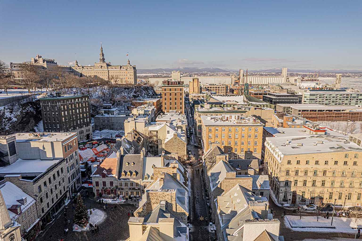 An aerial view of Rue Saint-Pierre beside Place Royale, showing how the old quarter is woven into the historic streets of Vieux-Québec.