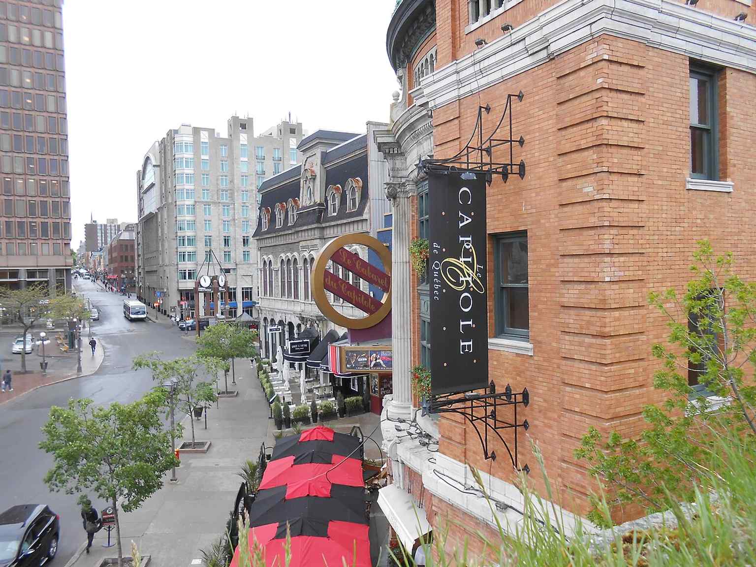 A later daylight view of the Capitole on Place D’Youville, showing the landmark still active at the heart of downtown Quebec.