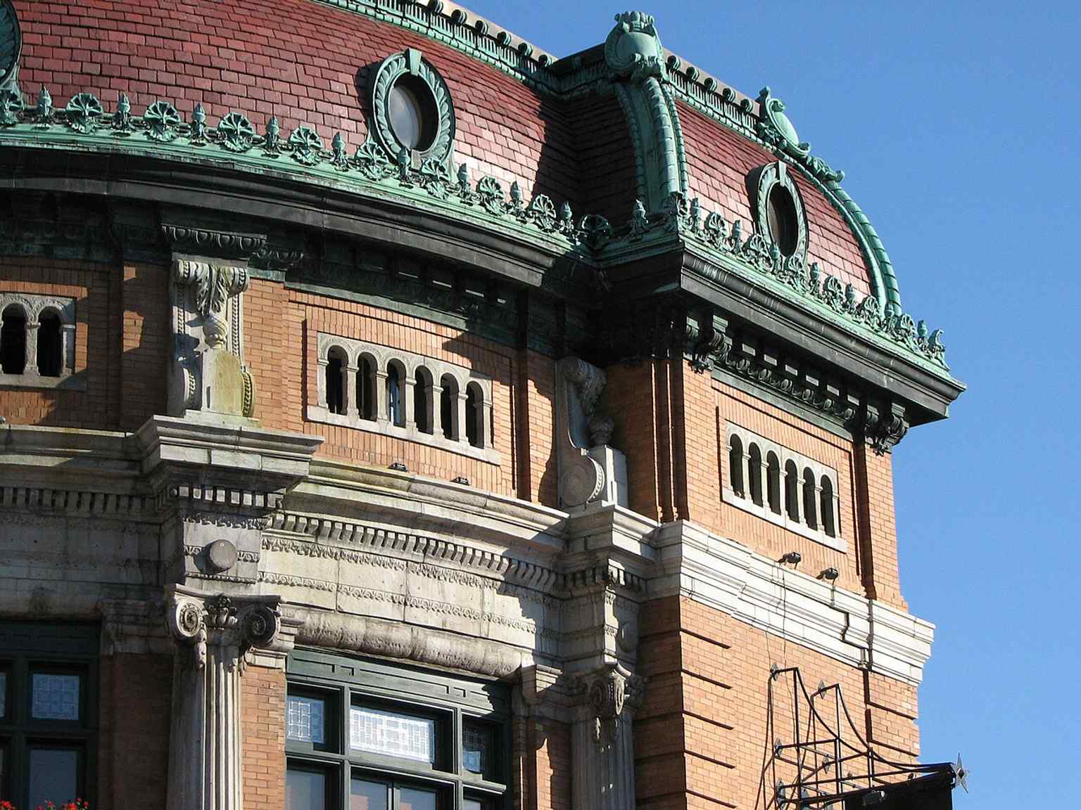 A detailed view of the façade ornamentation, useful for showing the theatre’s preserved early-20th-century design.