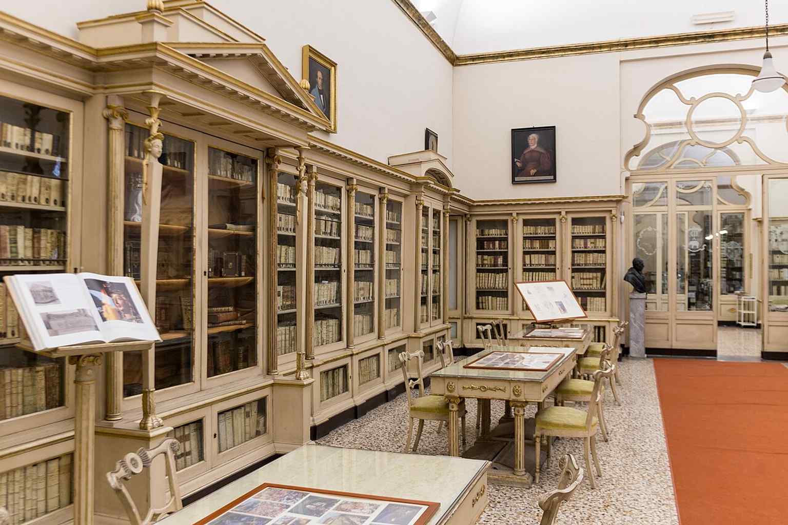 The reading room in active use today, showing the long, light-filled library spaces described in the history of the Benedictine holdings.