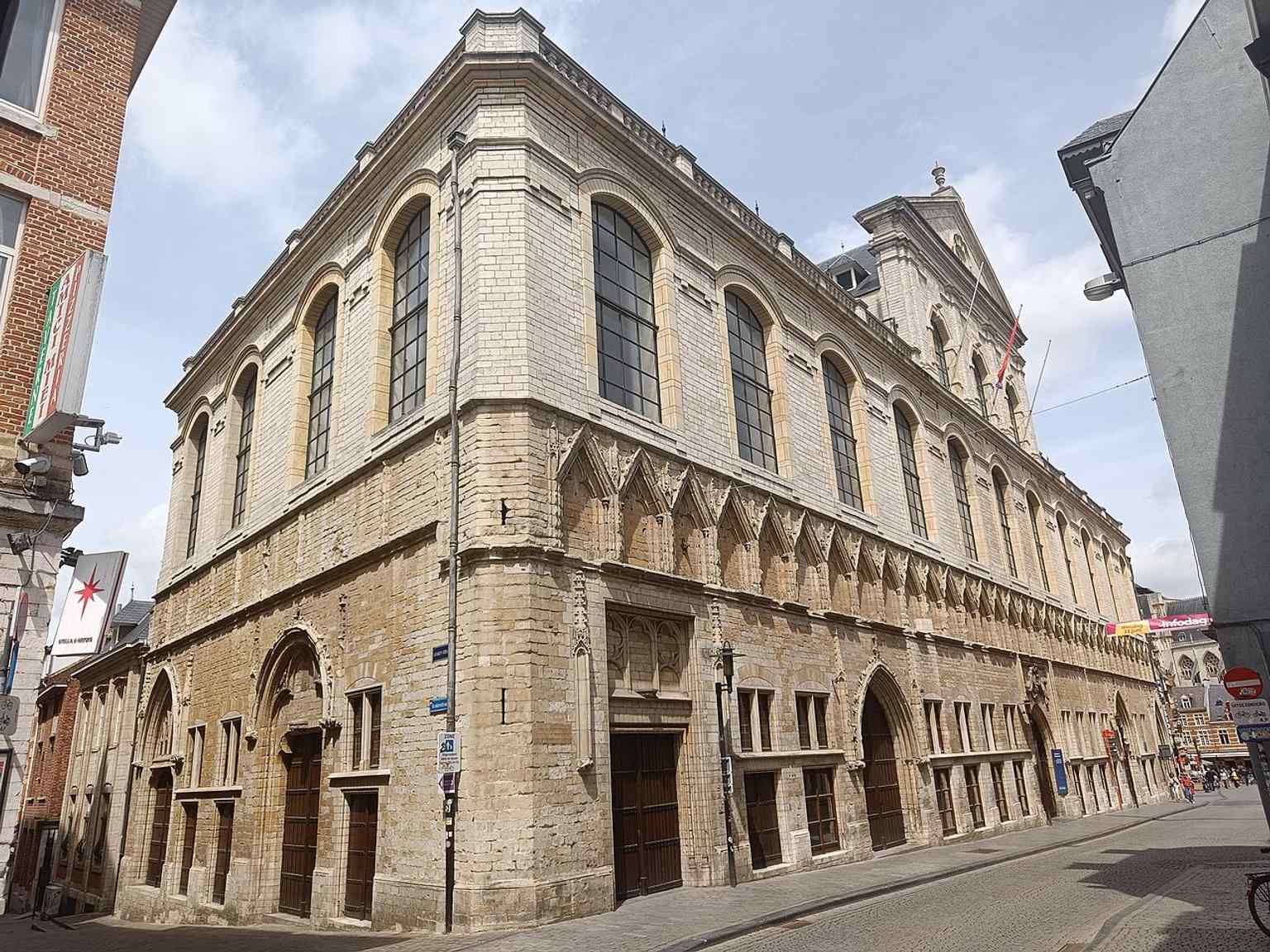 Another current façade view, useful for showing the building’s monumental scale on Leuven’s street grid.