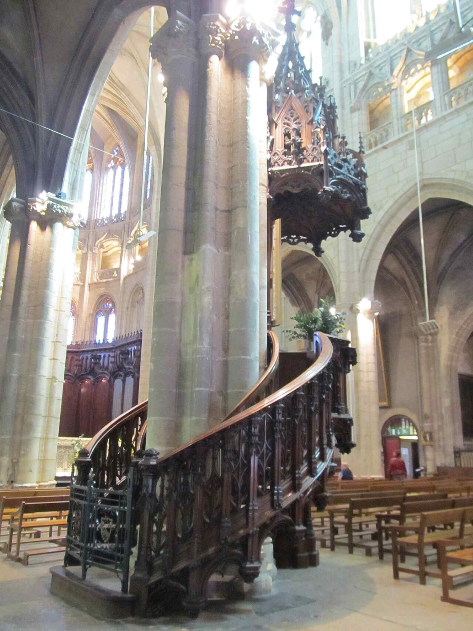 The pulpit illustrates the richly furnished interior added in the 19th century during the church’s restoration and revival.