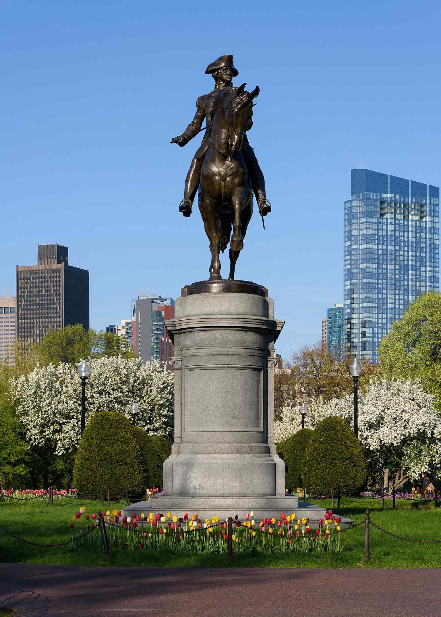 A modern view of the George Washington statue, showing how it anchors the Public Garden’s formal western entrance.