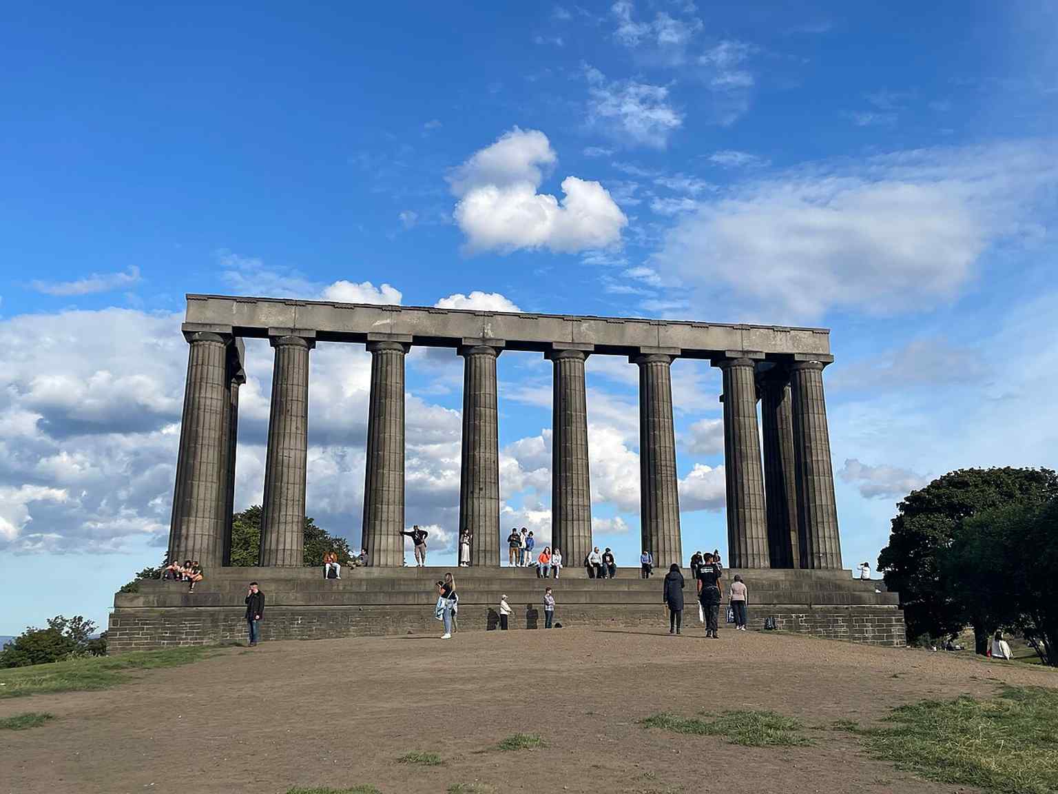 A closer modern view of the stone structure, useful for discussing the stalled construction and later conservation work.
