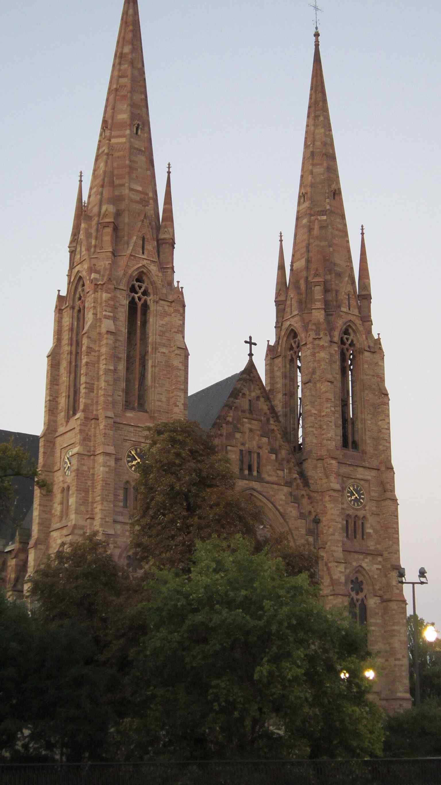 A clear view of the main west façade, showing the neo-Gothic front that was restored after the long 2009–2014 campaign.