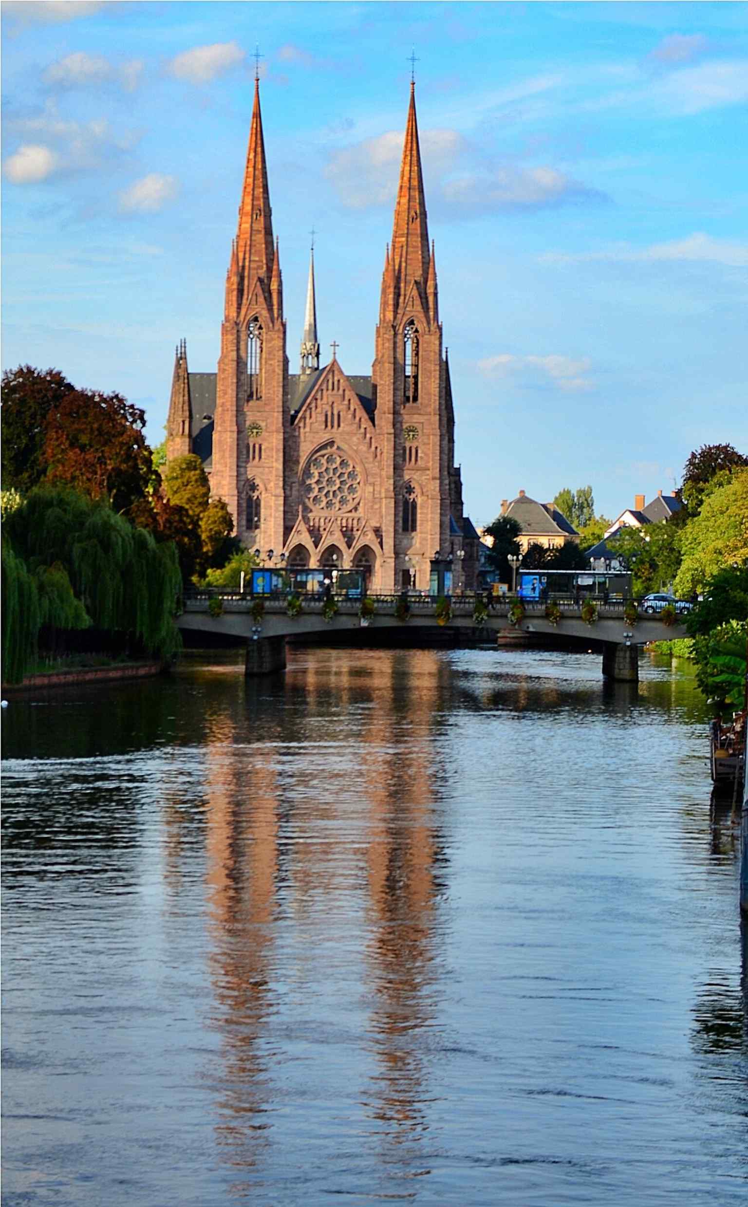 The church from the water, reinforcing its location at the junction of the city’s rivers and canals.