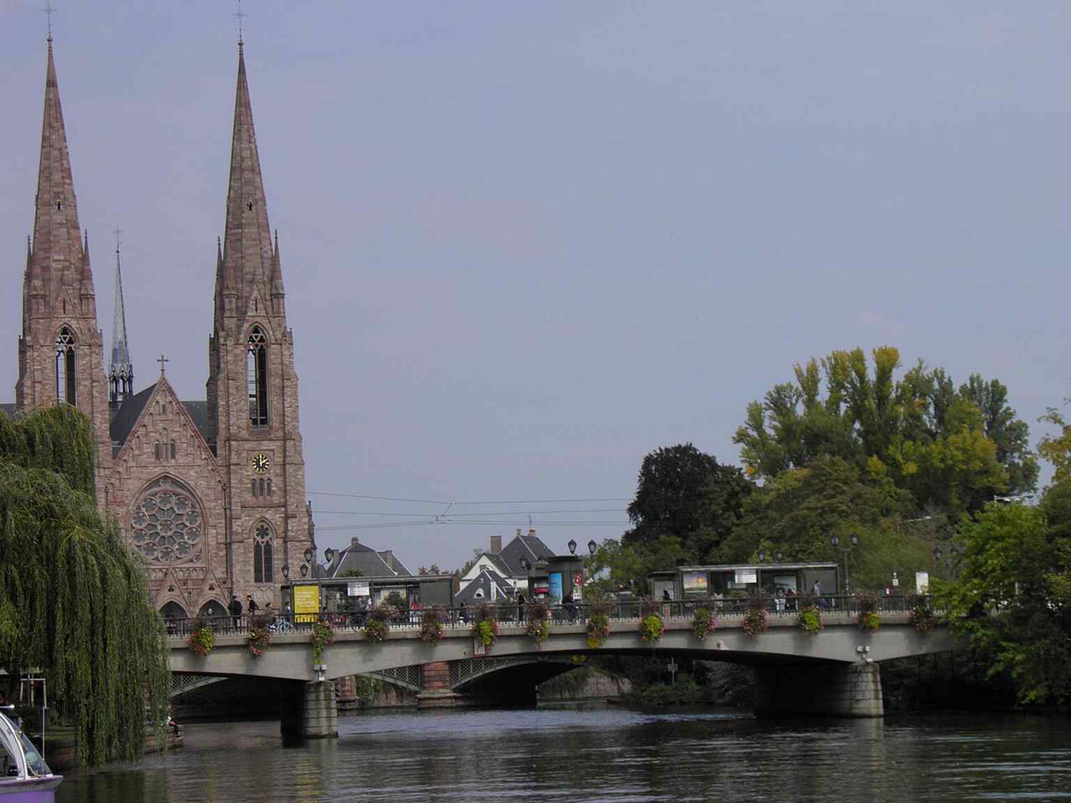 A broad riverside view where Saint Paul meets the Ill, matching the tour’s story about its setting and urban perspective.