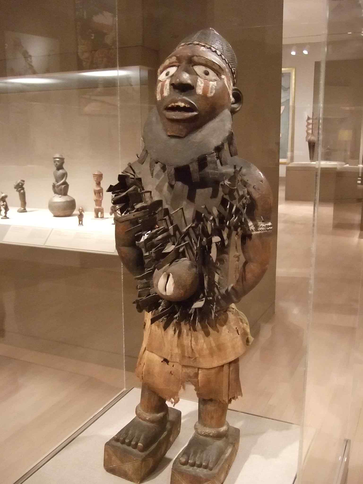 A Kongo power figure studded with nails, matching the museum’s emphasis on objects linked to leadership, ritual, and belief.