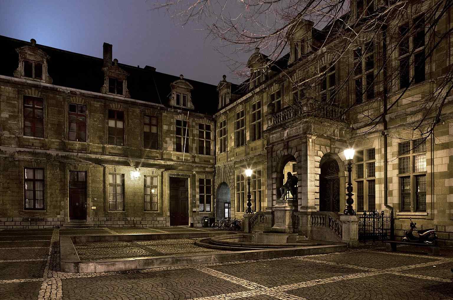 The library square with the bronze Hendrik Conscience statue at its center, echoing the 1883 opening and the square’s renaming in his honor.
