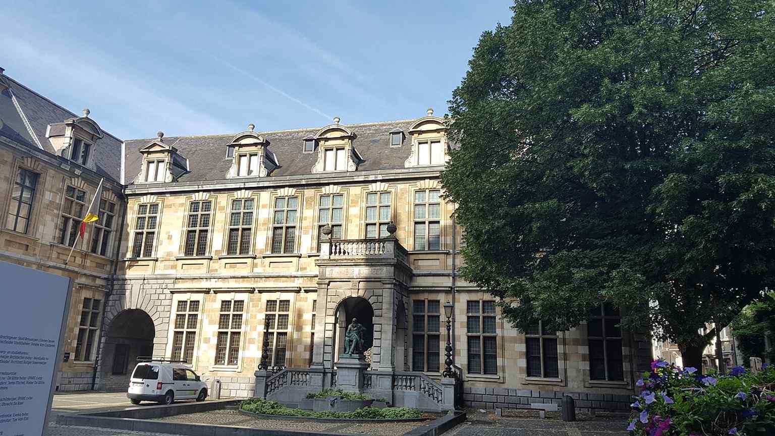 A wide, high-resolution exterior showing the full library complex, useful for placing the building on Hendrik Conscienceplein.