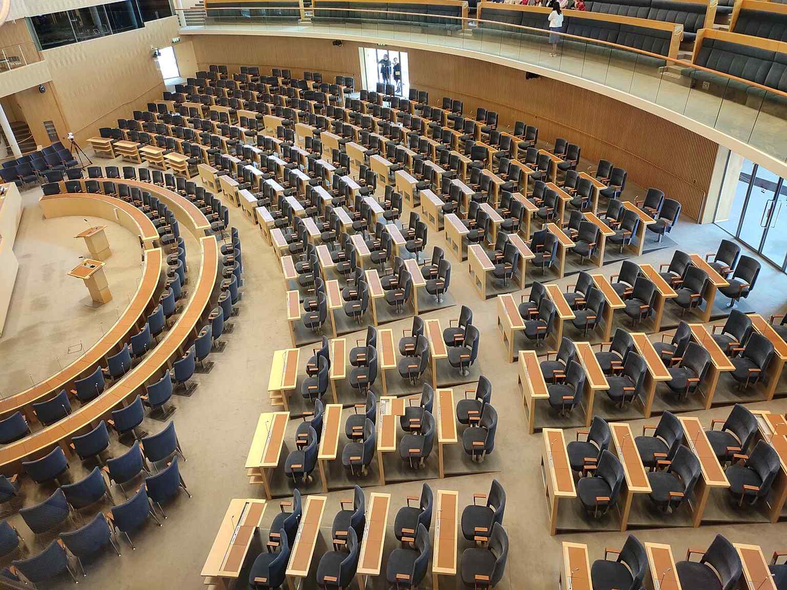 Another interior of the parliament’s meeting spaces, showing the formal setting where laws and government votes are handled.