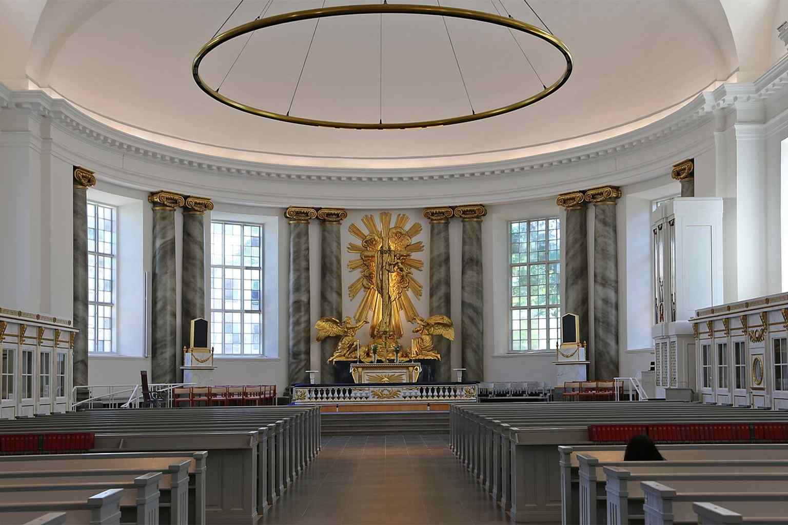 The spacious interior of Gothenburg Cathedral, showcasing elements of both classical and Empire styles.
