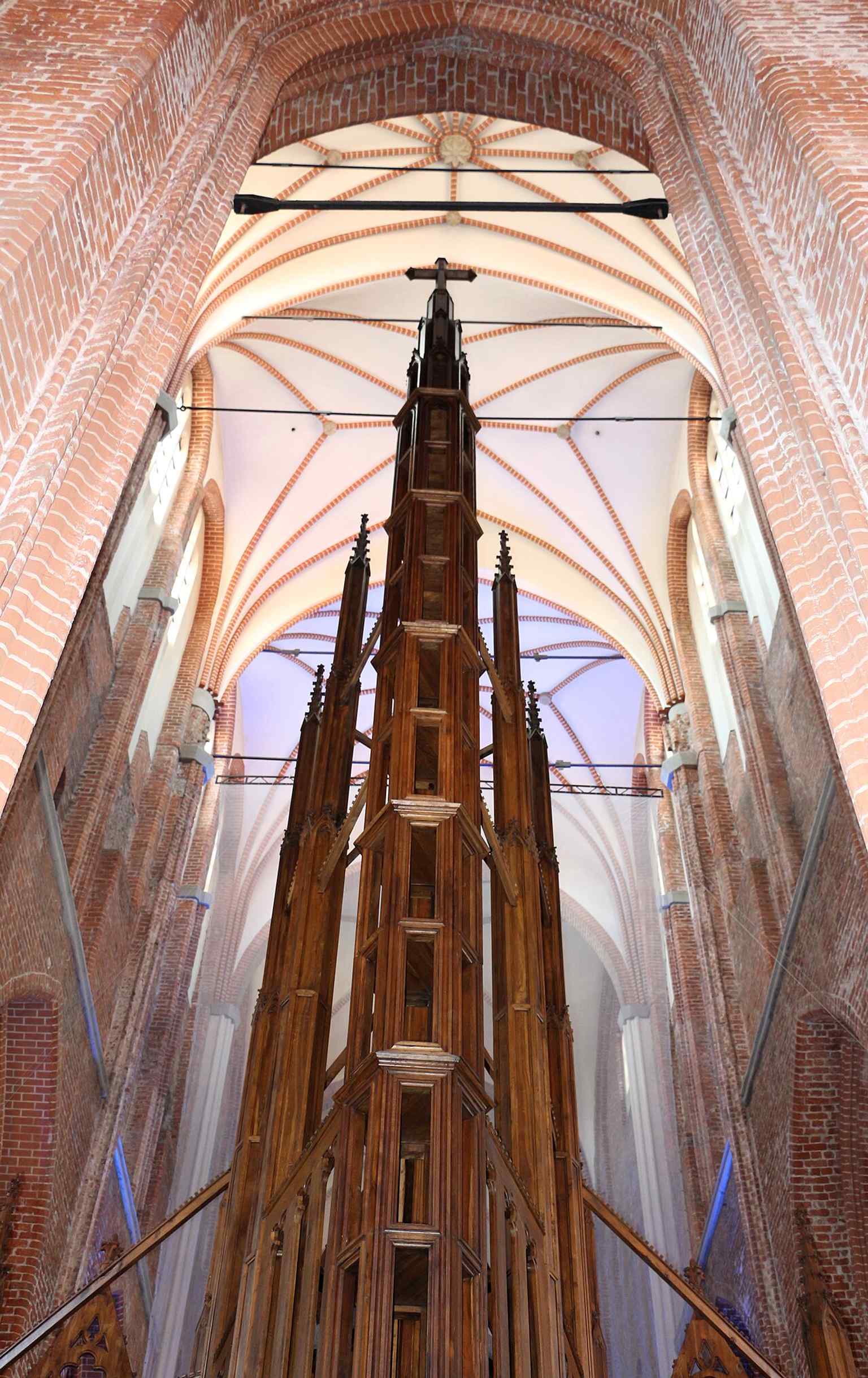 A view behind the altar area, ideal for illustrating the church’s layered history and its postwar interior restoration.