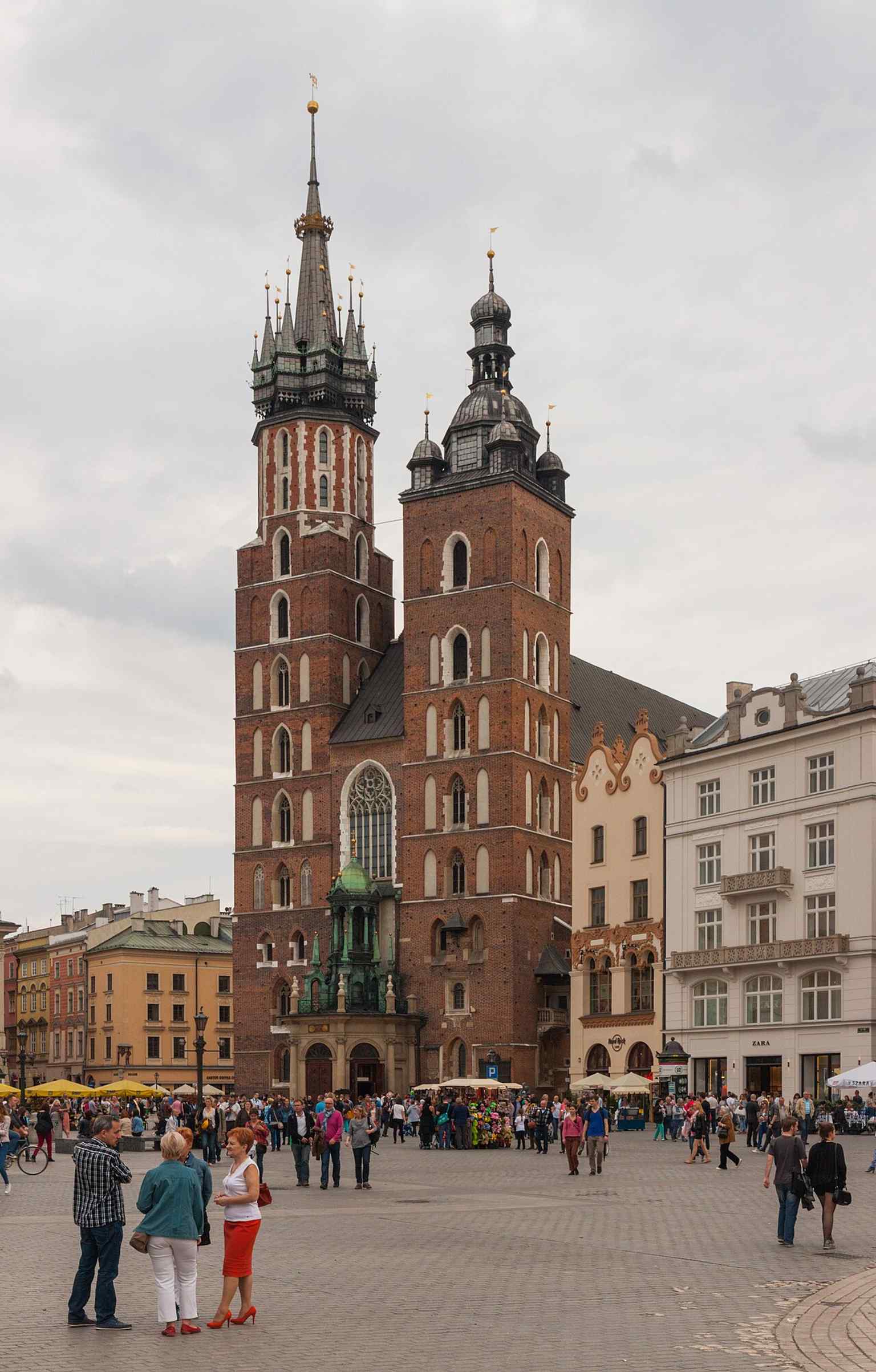 A strong overall view of the basilica from 2015, useful for showing the building’s Gothic massing and landmark status in Kraków.
