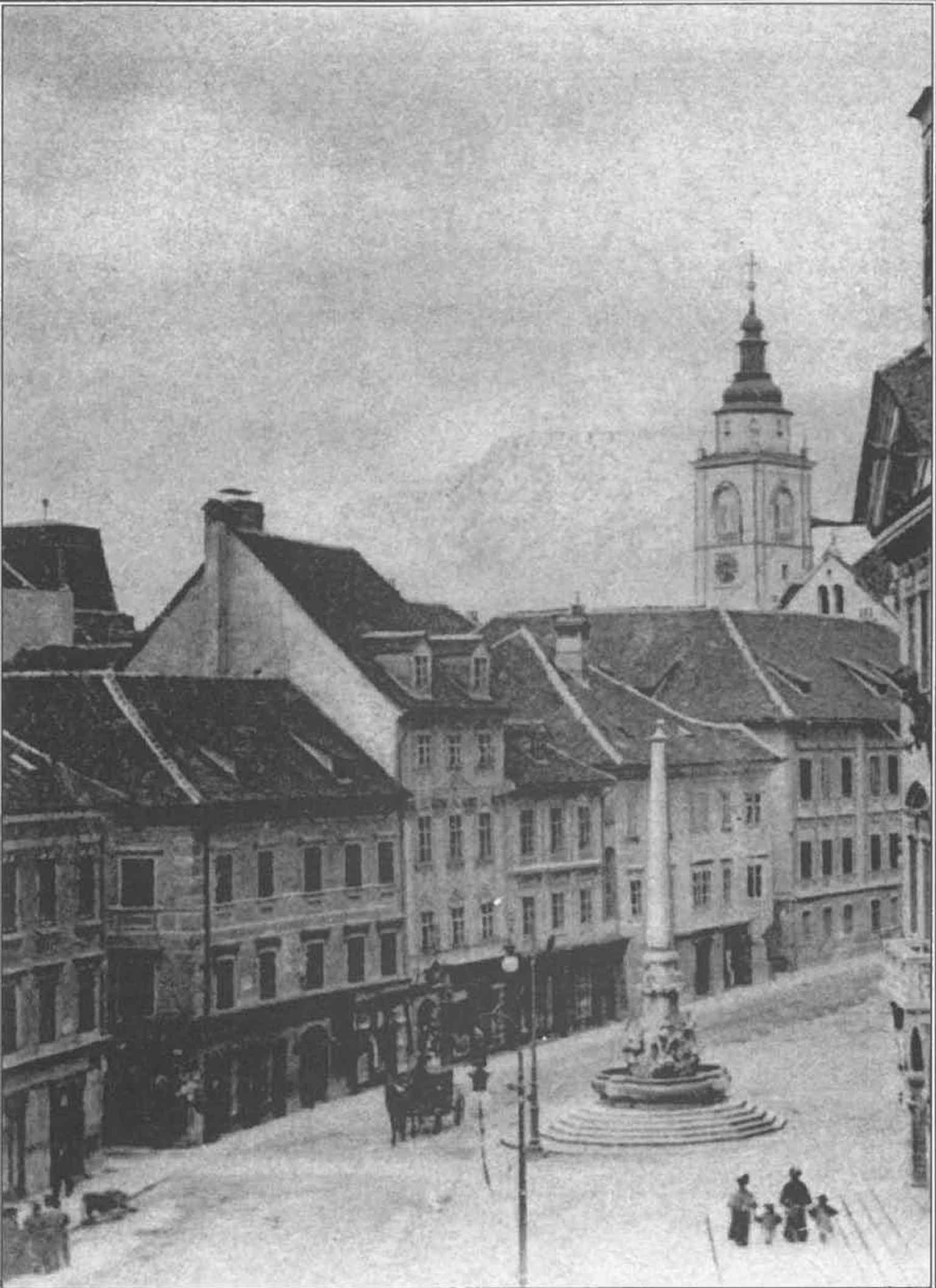 A historical photograph from 1895, showing the fountain and Town Square before many of its 19th and 20th-century alterations.