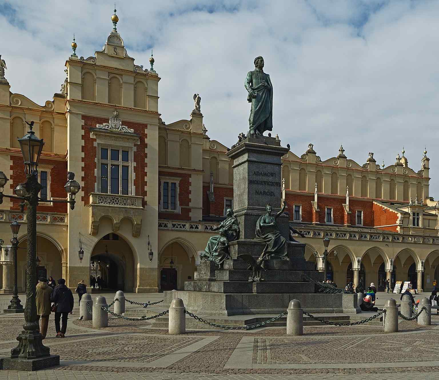 A 2022 close view of the monument, useful for showing the bronze surface and the care given to Kraków’s best-known statue.