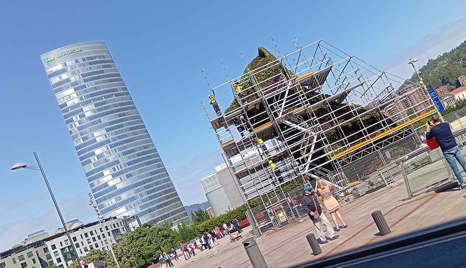 The tower’s sculptural rooftop feature during maintenance works, a reminder that the building also evolved after its 2012 inauguration.