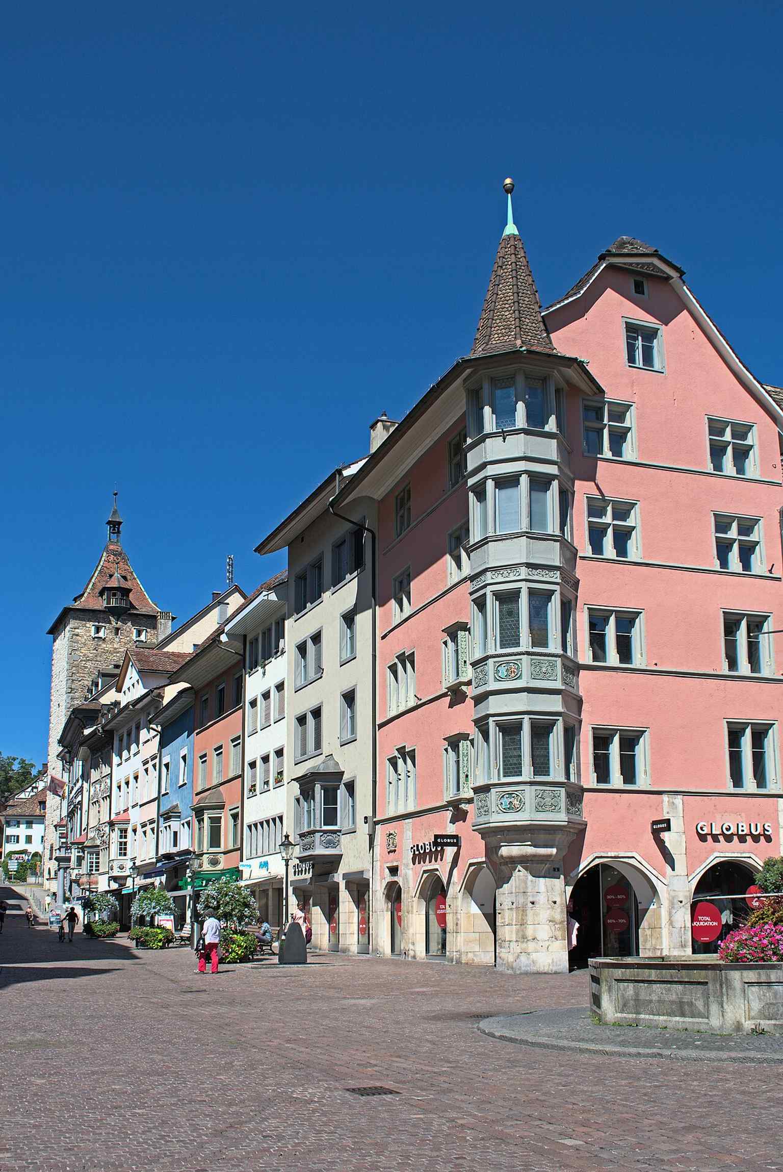 Looking along Fronwagplatz toward the Upper Town, with the Obertorturm visible at the end of the street — one of the two main axes leading out of the square.