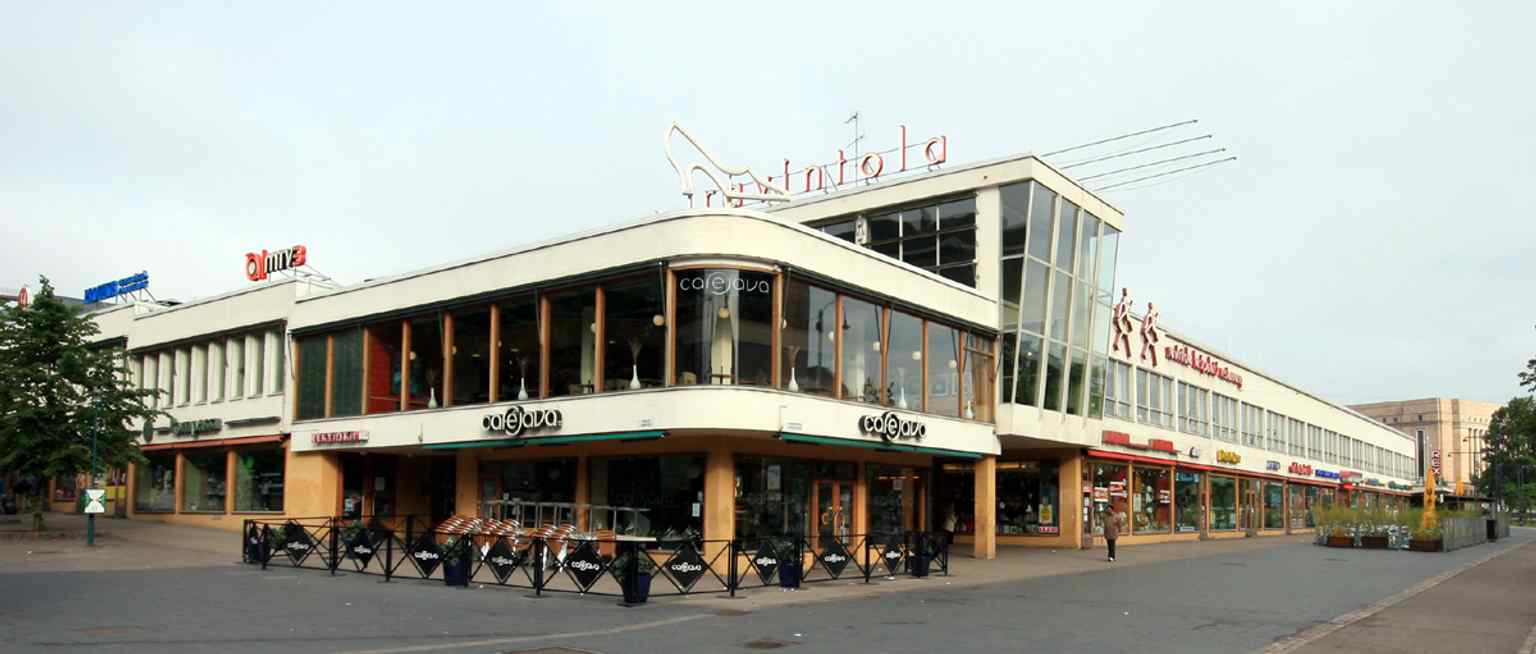 The 1936 Lasipalatsi Glass Palace, whose preserved façade and rooftop square form Amos Rex’s public entrance and urban setting.