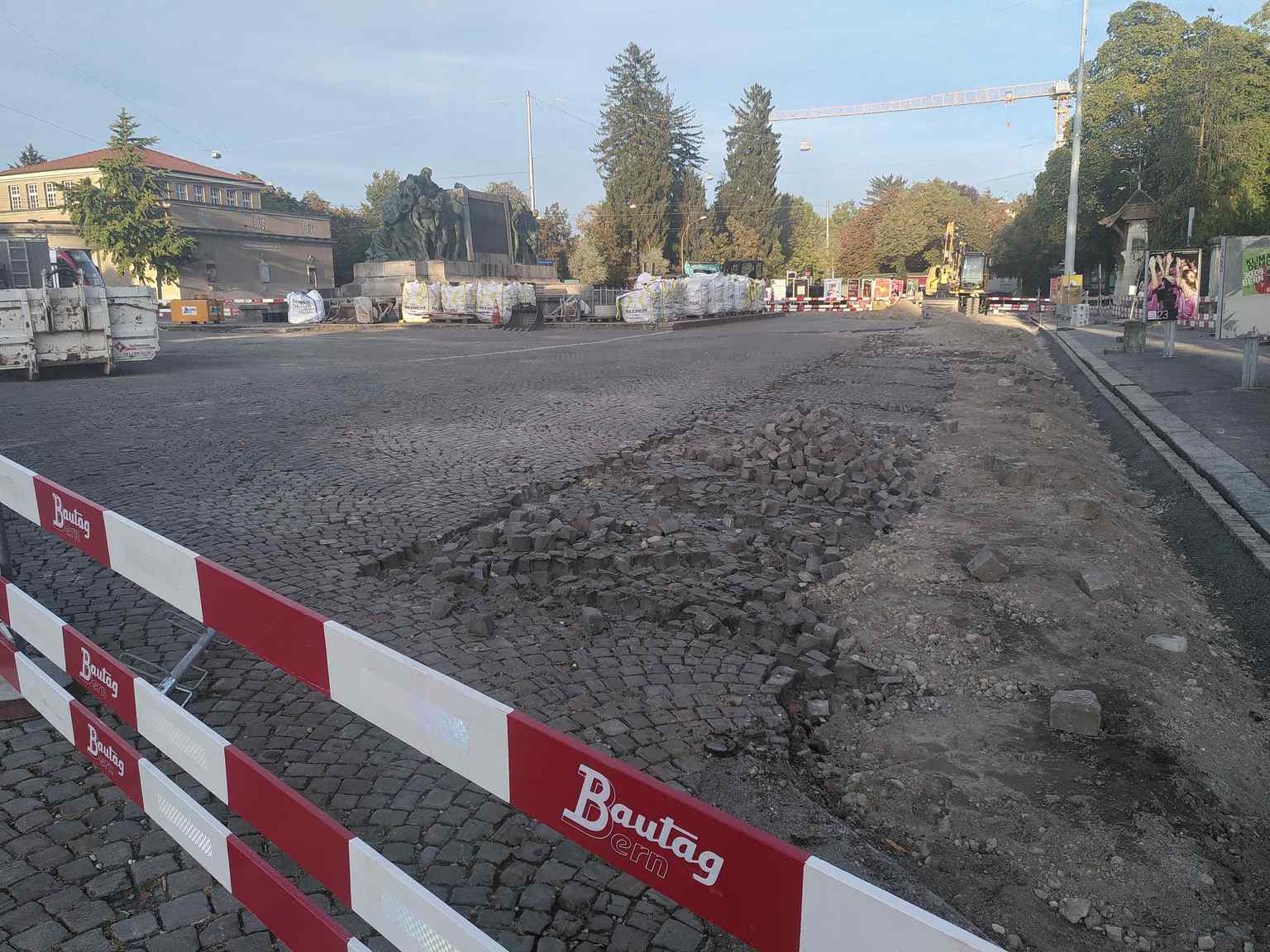 The Helvetiaplatz in Bern undergoing its 2023 transformation, where asphalt was removed and temporary greenery and seating were introduced to calm traffic and revitalize the square.
