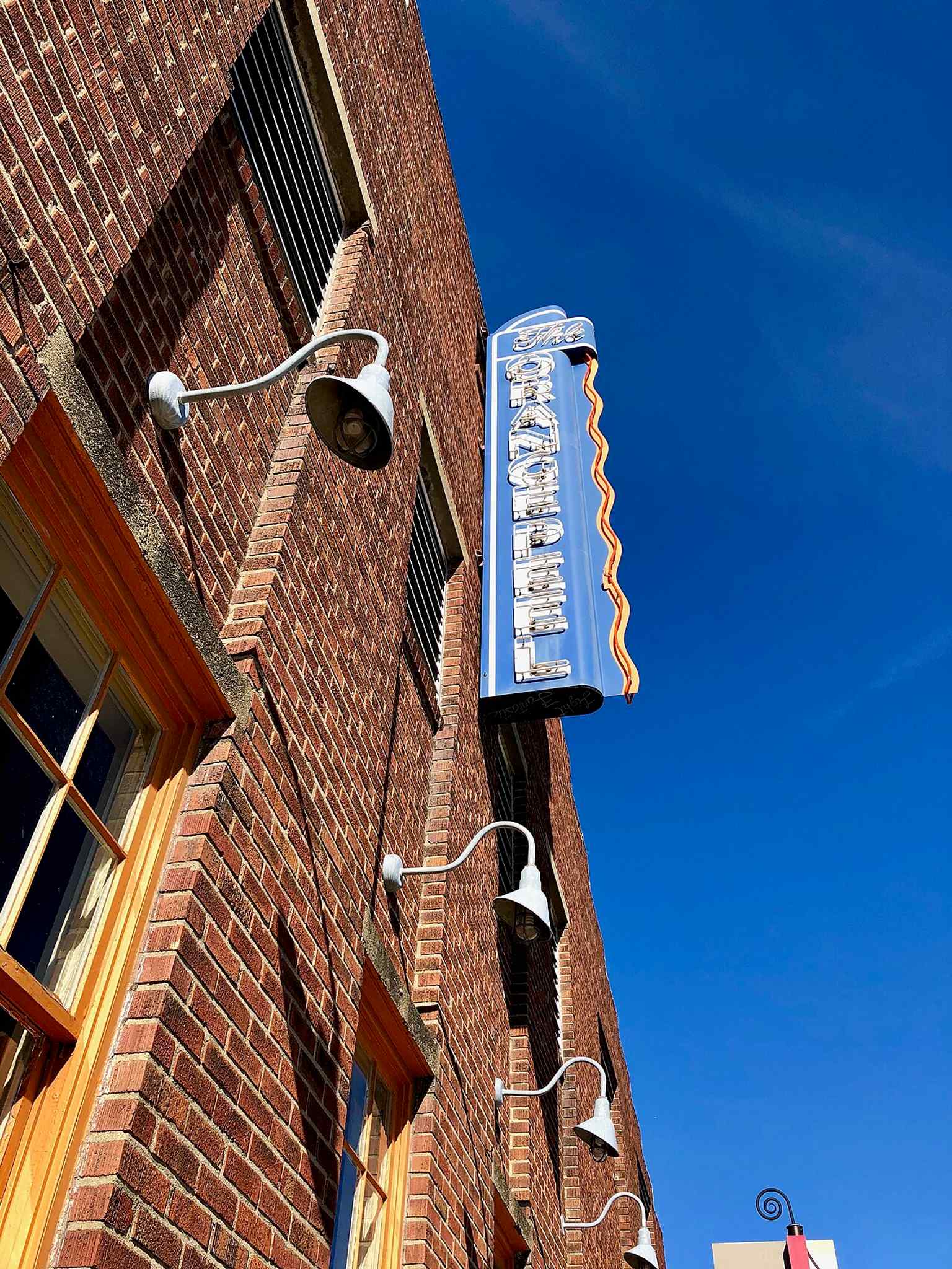 The Orange Peel sign in downtown Asheville — a reminder that the venue was reborn in 2002 and later named one of America’s top music venues.