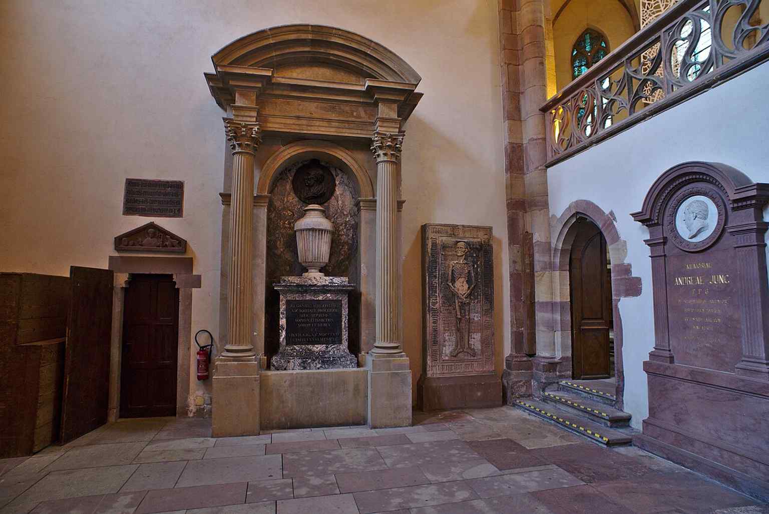 A funerary monument inside the church, reflecting Saint Thomas’s role as a burial place for notable Strasbourg figures.