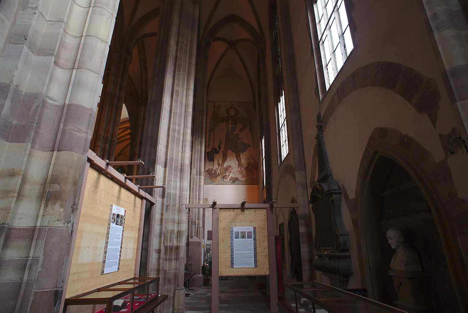 A wall painting in the church interior, linking the building to its layered medieval art and later restorations.