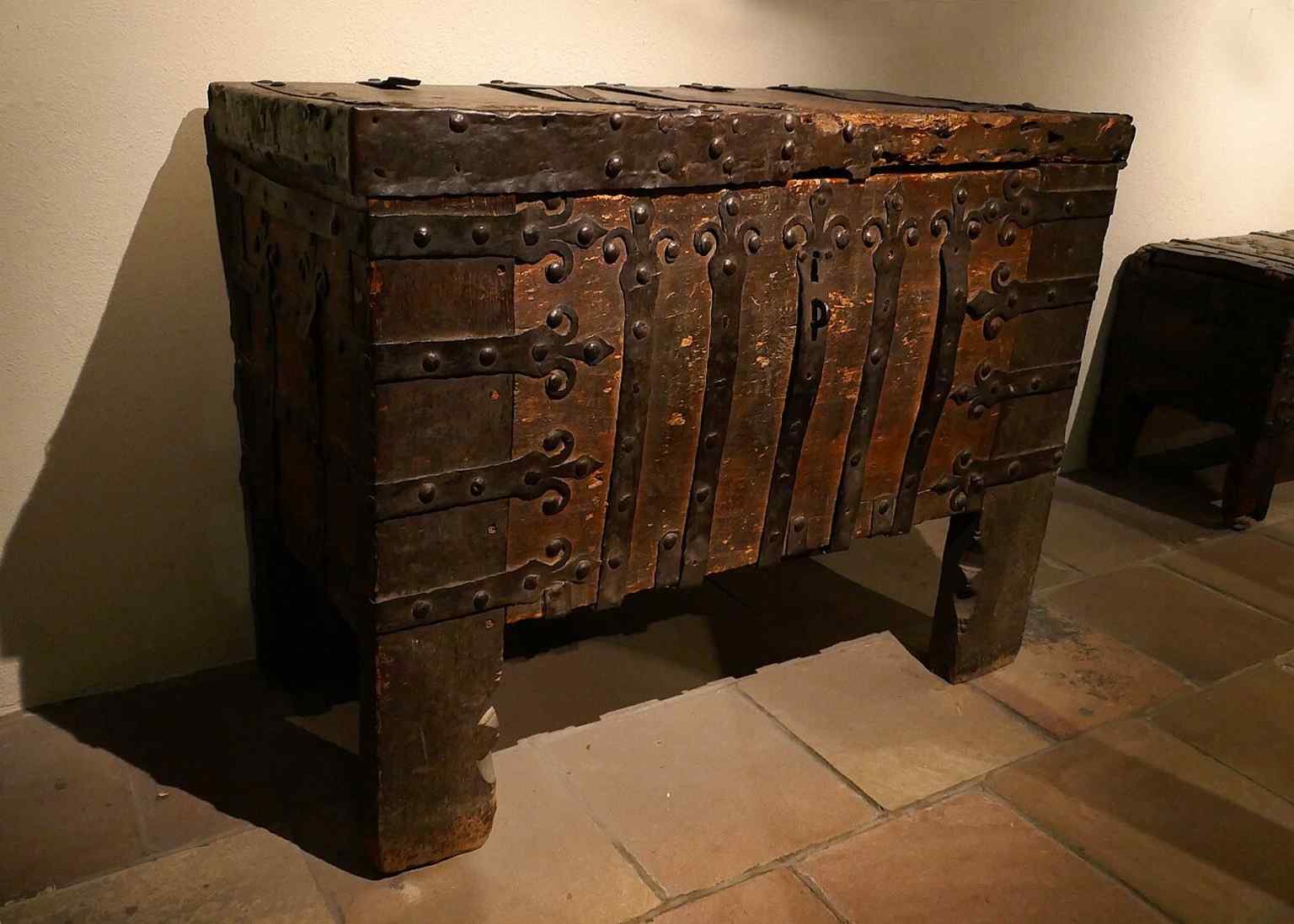 A medieval iron-bound chest from Saint Thomas, now in the Musée de l’Œuvre Notre-Dame, showing the church’s deep historical legacy.
