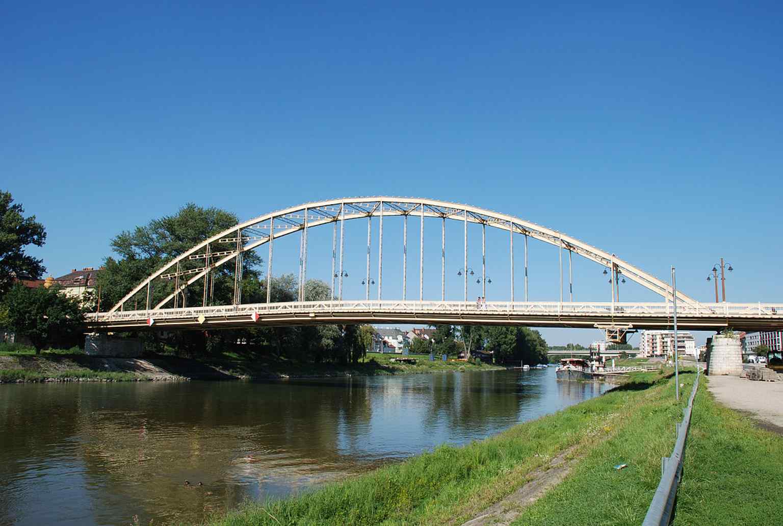 Another broad side view of the bridge, showing the iron structure that replaced earlier crossings here in the 1920s.