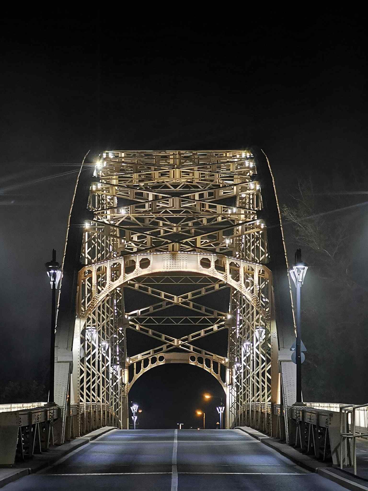 A night image of the bridge that fits the story of Kossuth Bridge as one of Győr’s most photogenic urban scenes.