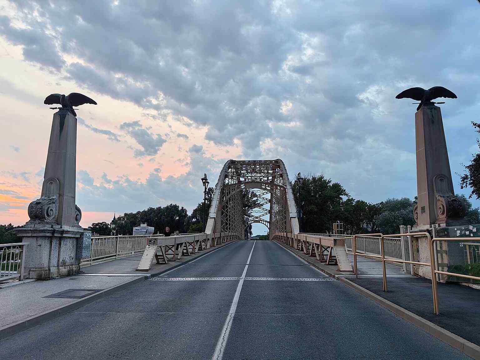 A modern daylight view of the bridge from Győr, highlighting its role as a busy urban connection rather than just a river crossing.