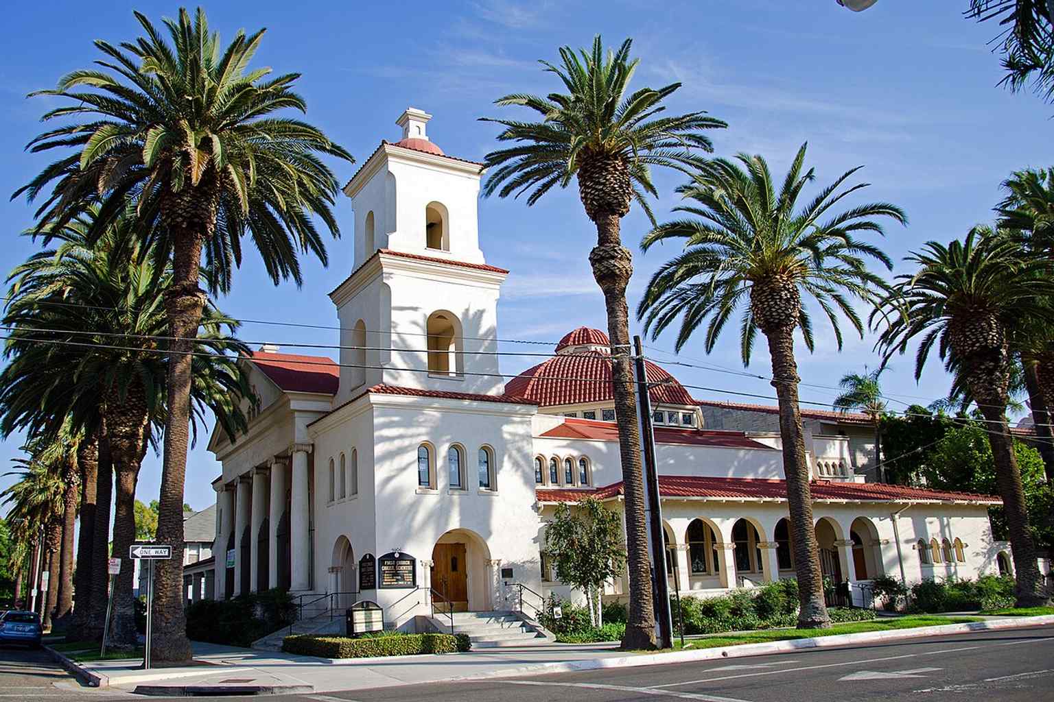 Street-level view of the 1901 Mission Revival church at 3606 Lemon Street, the building credited with introducing Christian Science to Southern California.