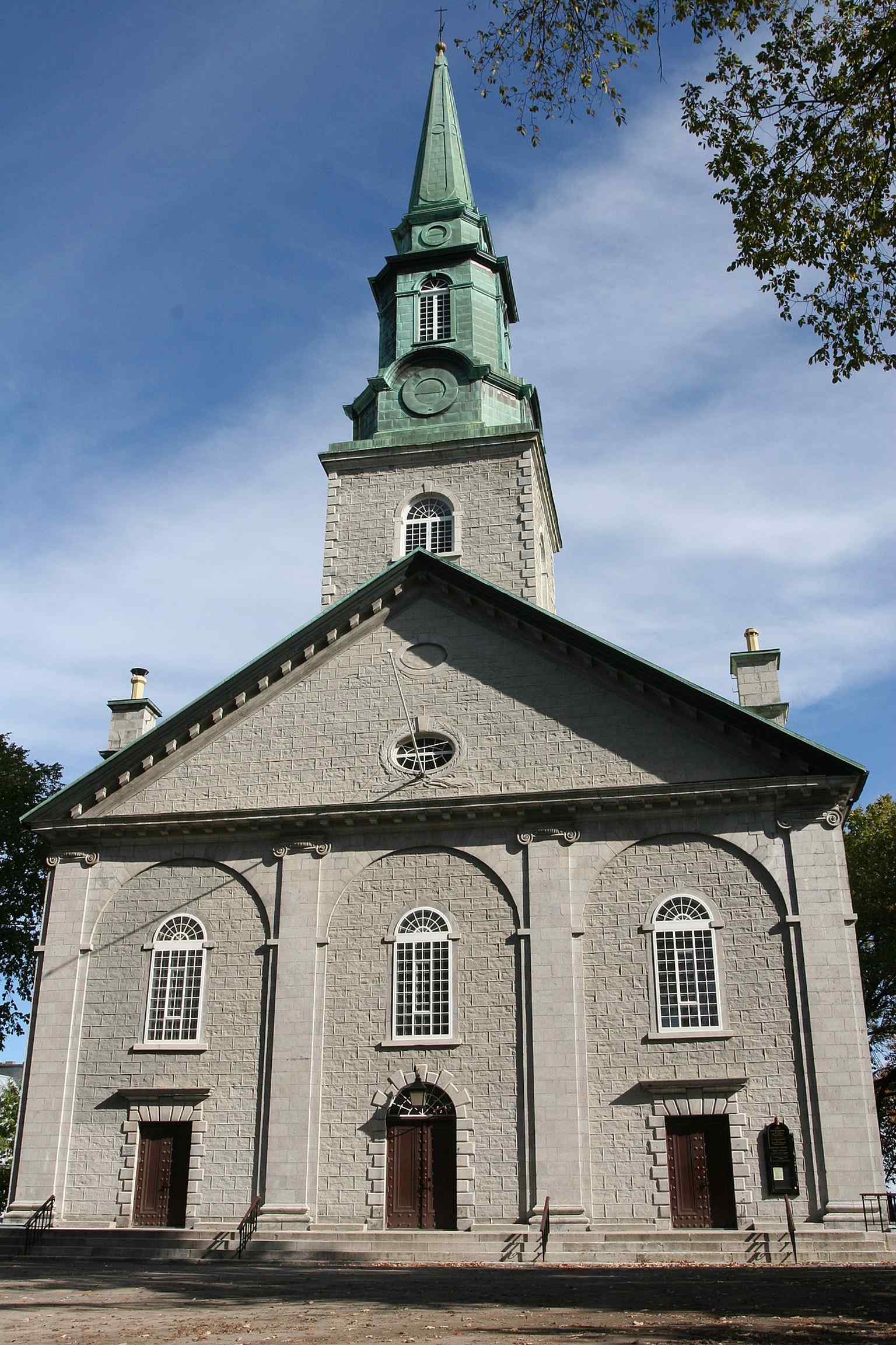 A clear front view of the cathedral in Place d’Armes, where its restrained neoclassical form reflects the Anglican presence that Bishop Jacob Mountain fought to establish in Quebec.