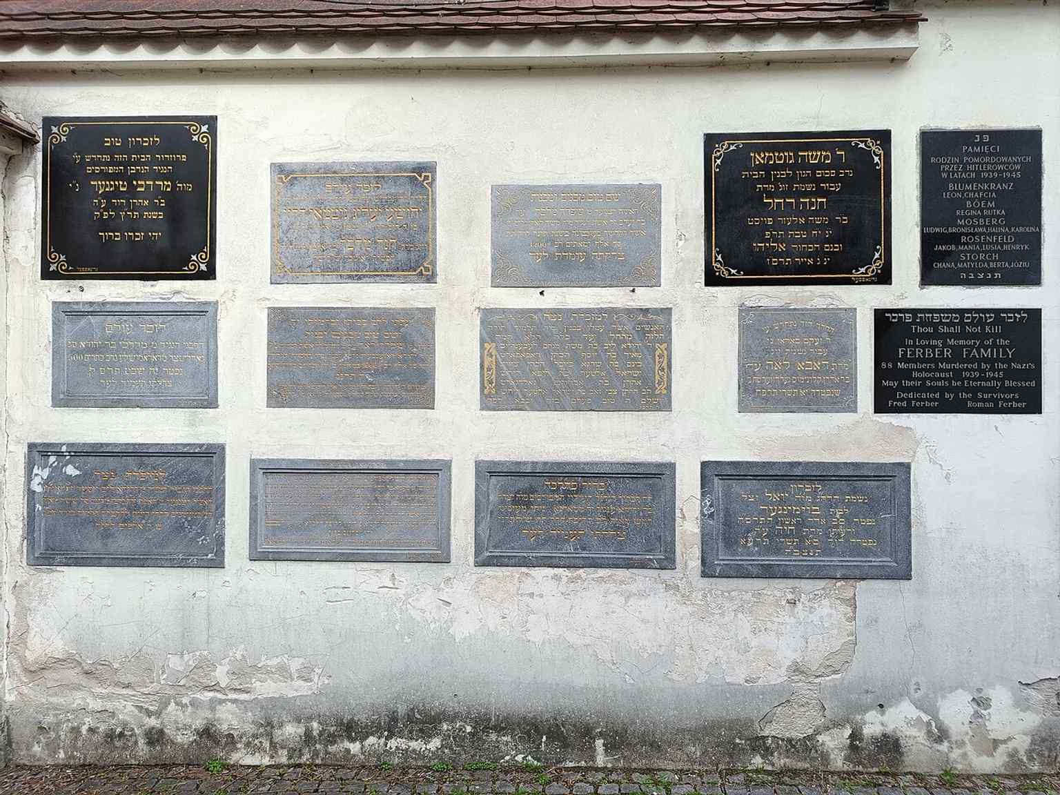 The restored tombstones highlight how the cemetery was rebuilt after Nazi destruction and later cleared in a major 1959 recovery effort.