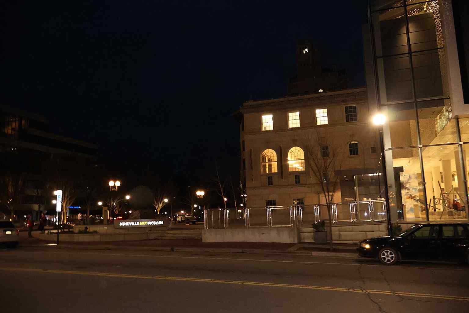 Another exterior perspective of the museum, showing the downtown setting that replaced earlier homes on Charlotte Street and in the Montford District.