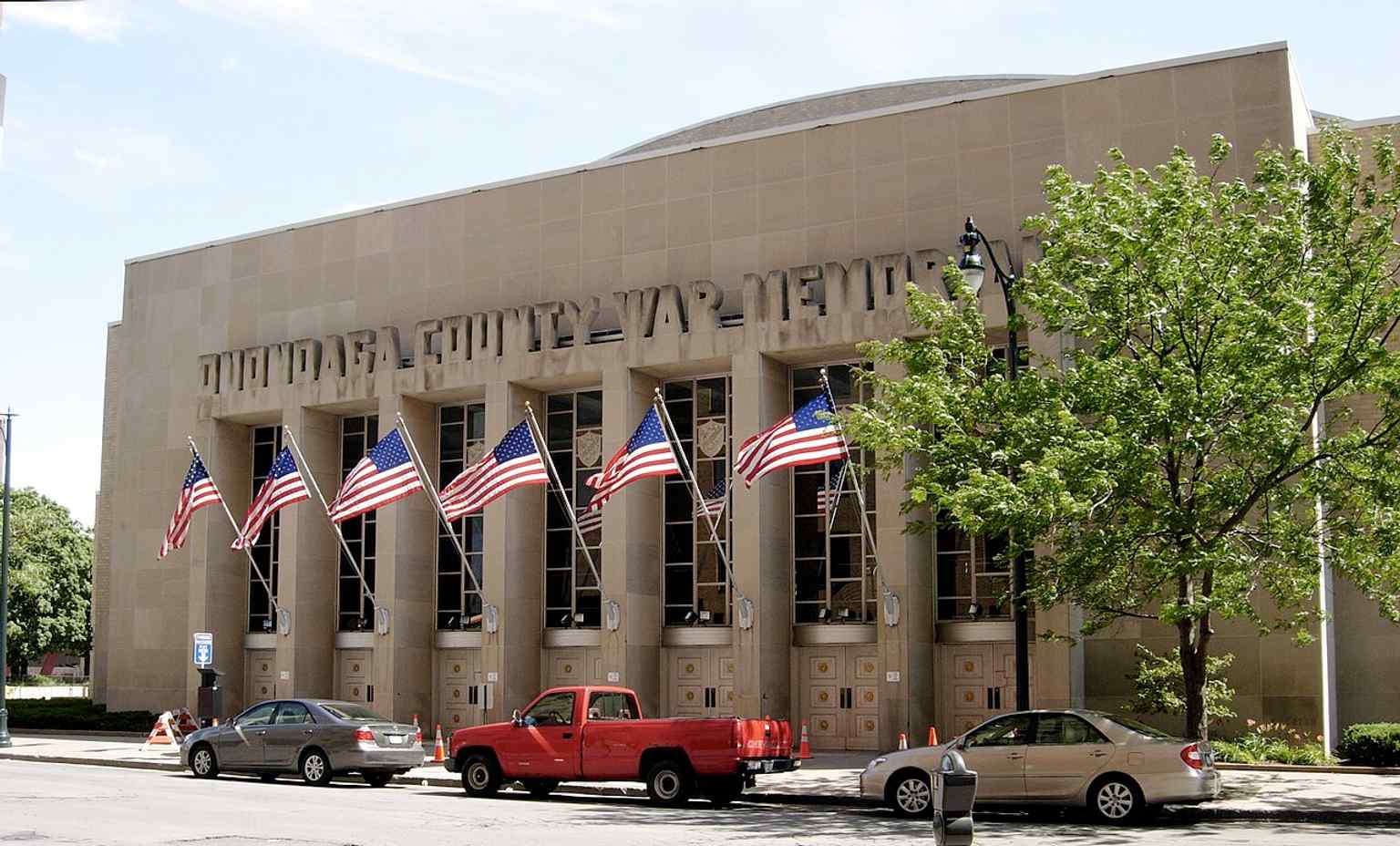 A side entrance showing the arena’s sturdy mid-century façade, part of the historic complex later listed on the National Register of Historic Places.