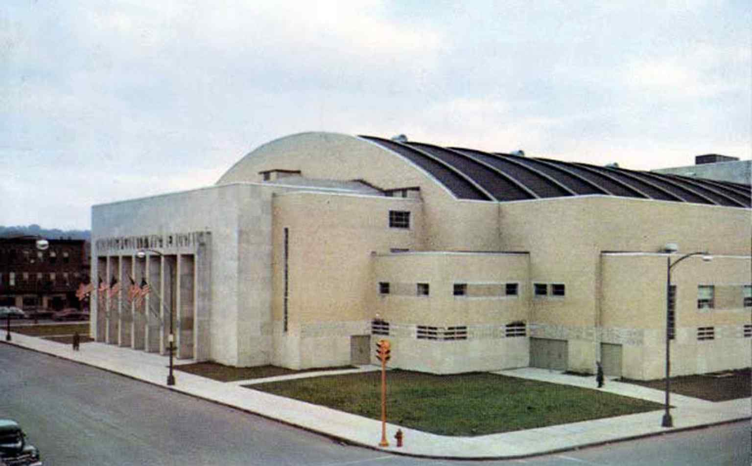 A 1954 postcard of Memorial Hall Entrance, capturing the building soon after it replaced the lost Archbold Gymnasium basketball home downtown.